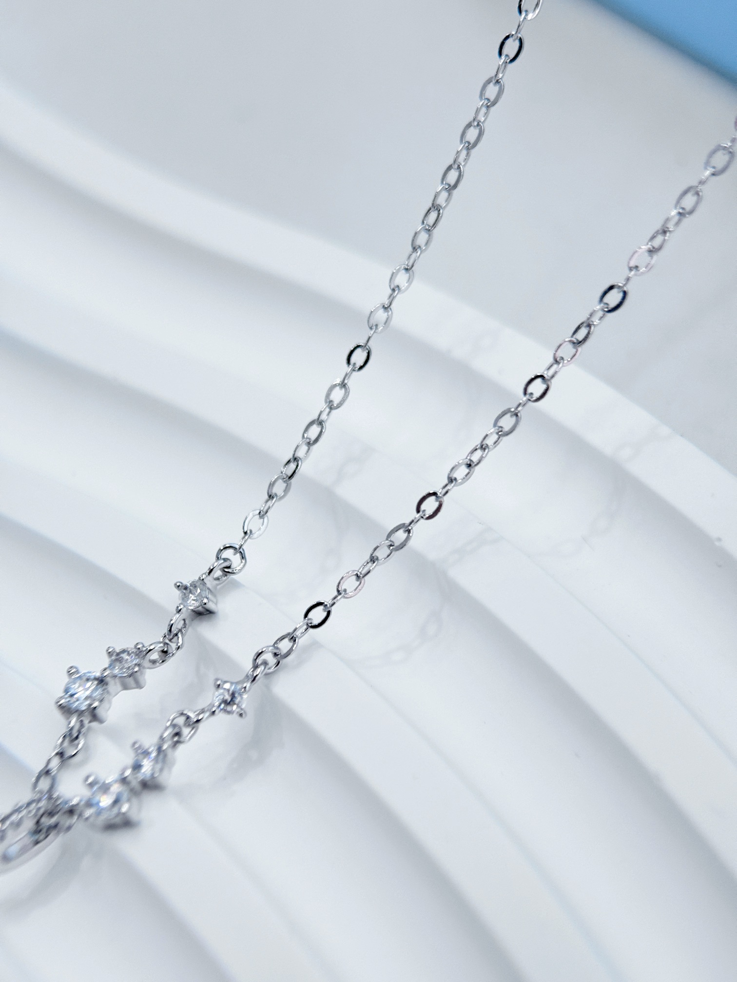 Set with delicate cubic zirconia, this necklace features six stones - Comprehensive 5