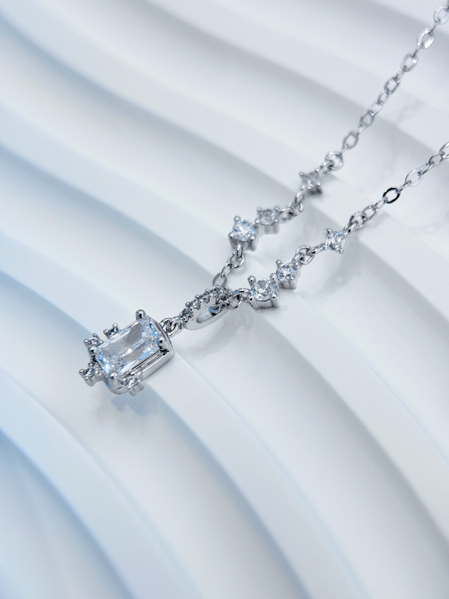 Set with delicate cubic zirconia, this necklace features six stones - Comprehensive 3