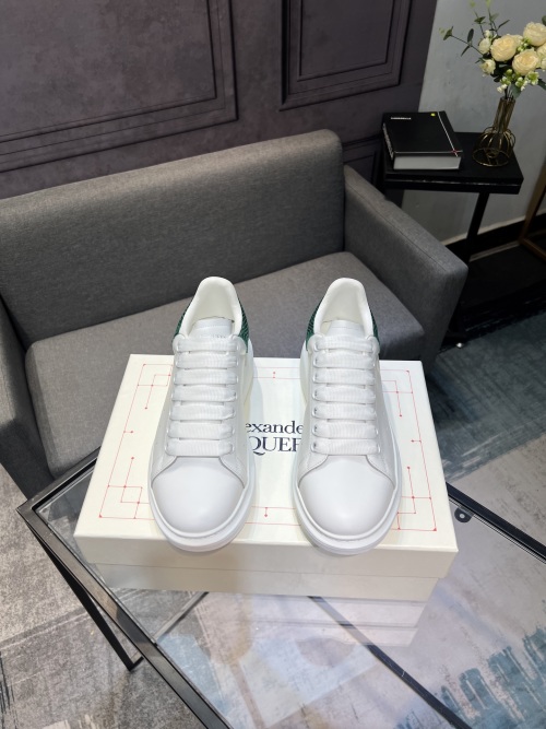 Alexander McQueen White Leather Oversized Sneakers with Green Heel 1 Alexander McQueen White Leather Oversized Sneakers with Green Heel