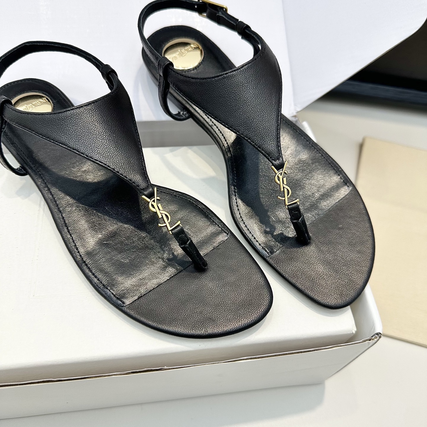 YSL Cassandra Thong Flat Sandals