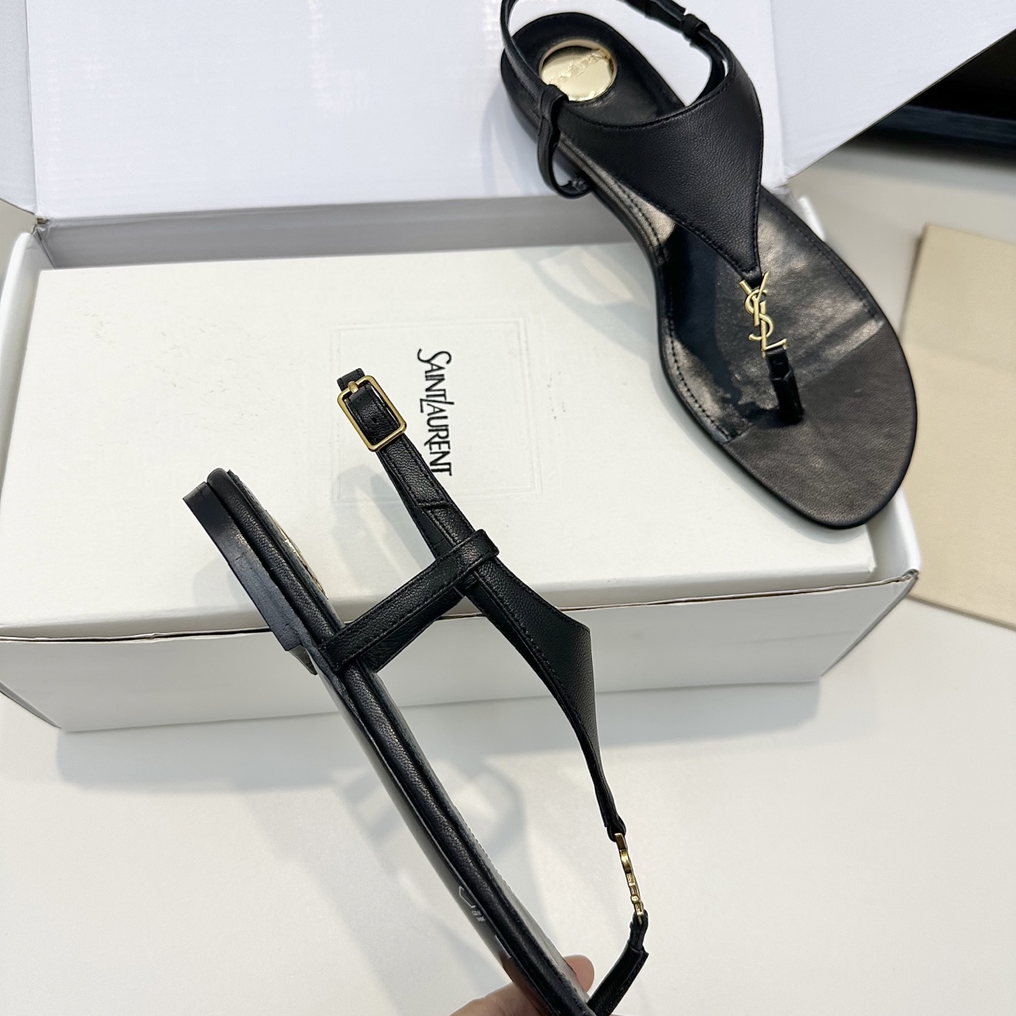 YSL Cassandra Thong Flat Sandals