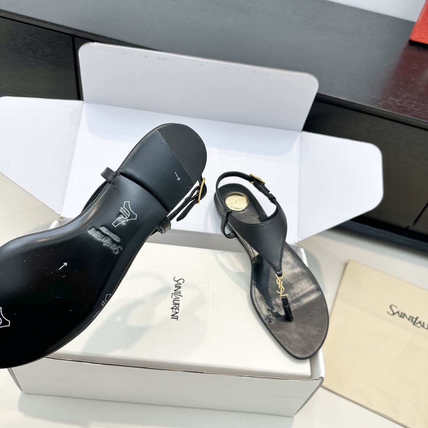 YSL Cassandra Thong Flat Sandals
