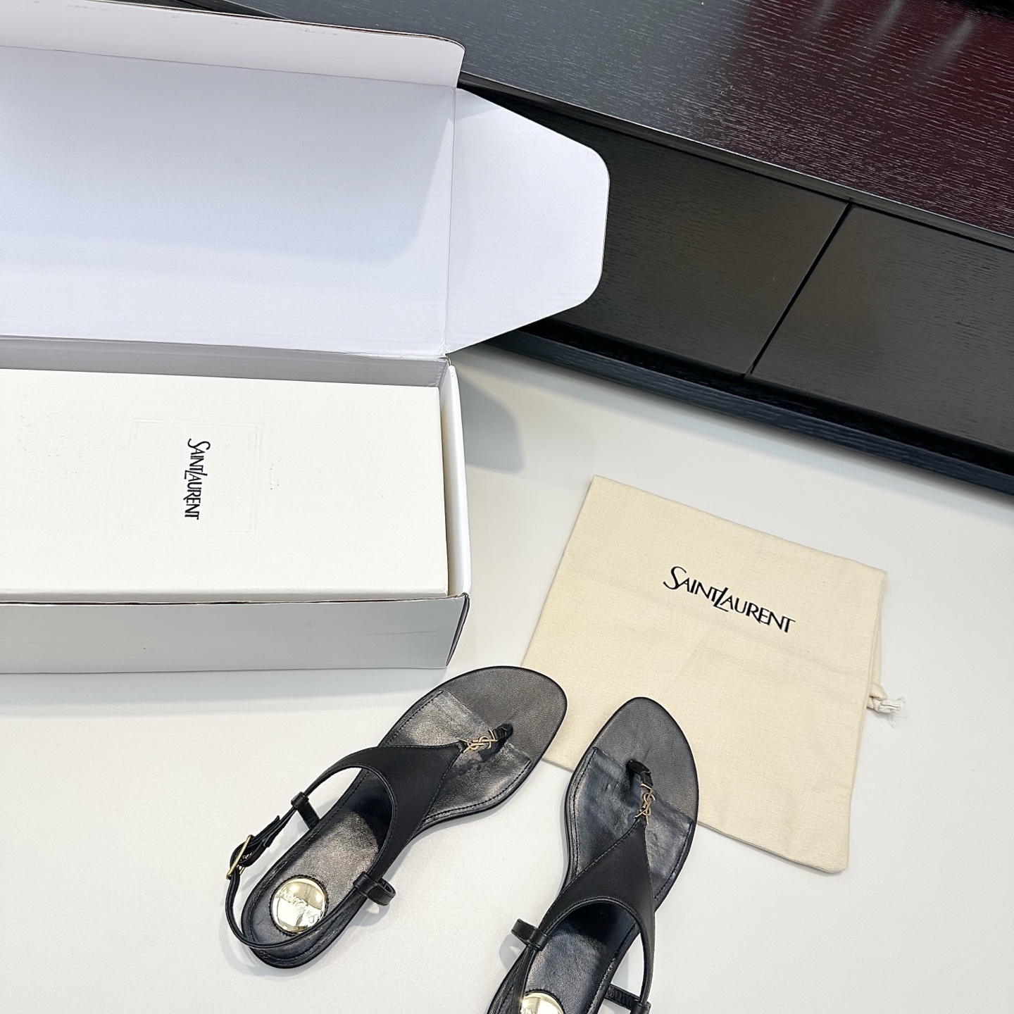 YSL Cassandra Thong Flat Sandals