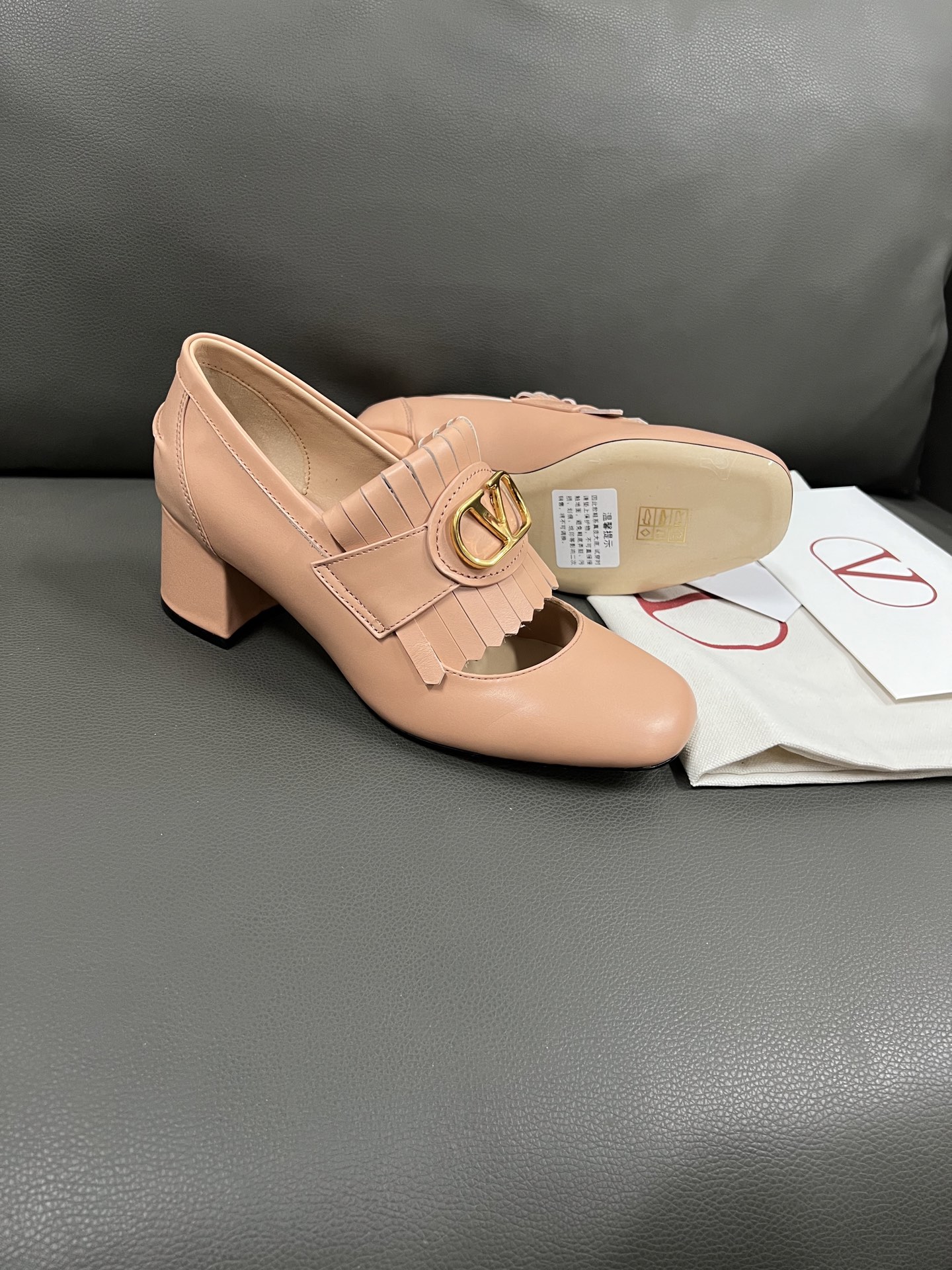 Valentino Women's Leather Block Heel Mary Jane Pumps with Tassel and Logo 1 Valentino Women's Leather Block Heel Mary Jane Pumps with Tassel and Logo