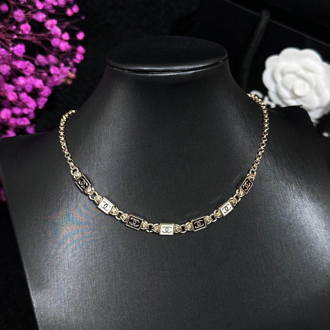 Chanel Jewelry Necklaces & Pendants Black White Yellow Brass