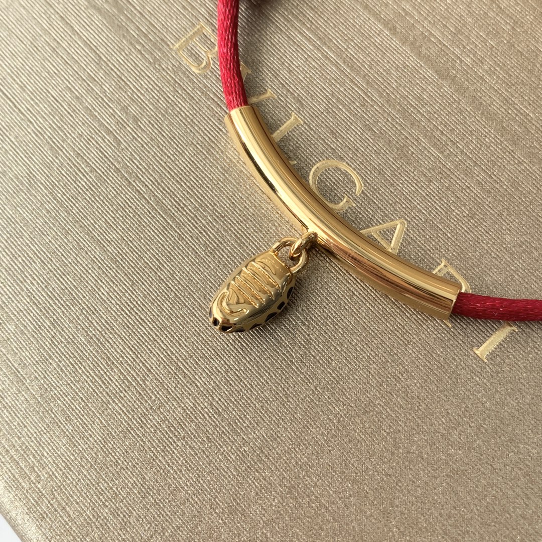 Featuring the iconic motif paired with a woven red cord, this bracelet - Jewelry 5