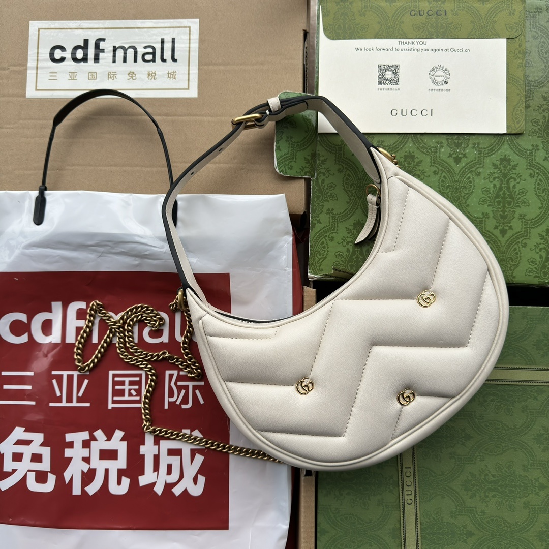 配全套原厂绿盒包装GGMarmont半月造型迷你手袋这款GGMarmont系列半月造型迷你手袋以柔软皮焕