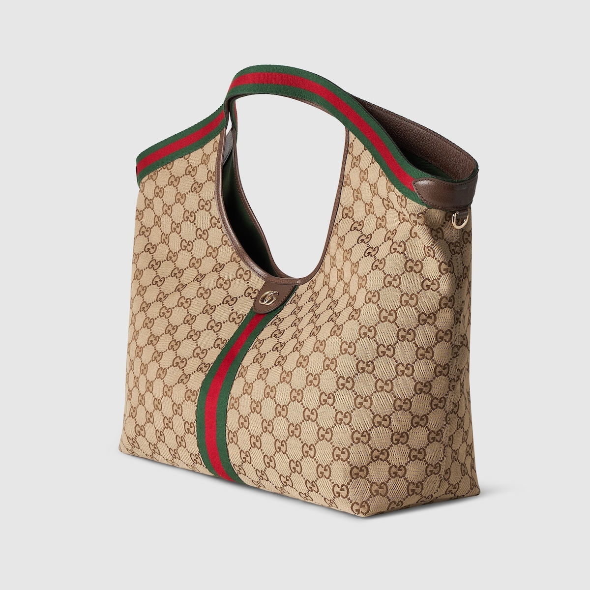 【秀场首发]Gucci Giglio系列大号托特包
853971 
商品详情
Gucci Giglio系列全新亮相佛罗伦萨2026早春时装秀，致敬品牌意式根源，融合隽永传承与革新精神。这款大容量托特包采用GG帆布匠心打造，缀饰织带滚边，并配有一个可拆卸的手拿包。
商品细节
·米白和深棕色GG帆布·饰红绿织带滚边·绿色棉布衬里·双G
·配可拆卸手拿包
顶部提手:18厘米高·磁扣开合
60厘米(宽)x47厘米(高)x16厘米(深)