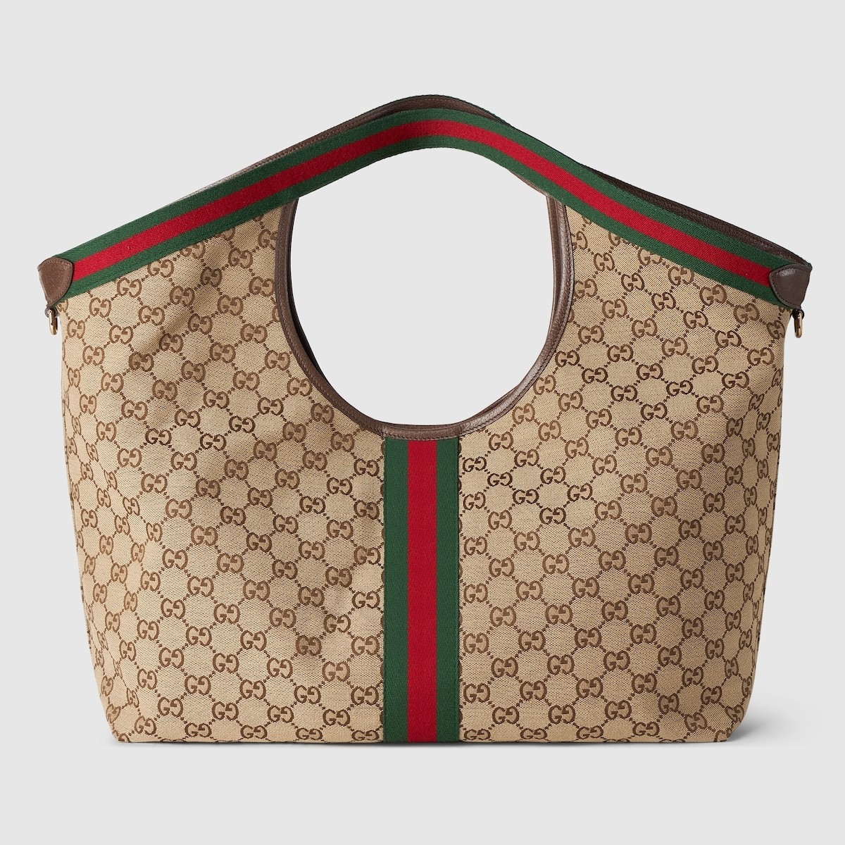 【秀场首发]Gucci Giglio系列大号托特包
853971 
商品详情
Gucci Giglio系列全新亮相佛罗伦萨2026早春时装秀，致敬品牌意式根源，融合隽永传承与革新精神。这款大容量托特包采用GG帆布匠心打造，缀饰织带滚边，并配有一个可拆卸的手拿包。
商品细节
·米白和深棕色GG帆布·饰红绿织带滚边·绿色棉布衬里·双G
·配可拆卸手拿包
顶部提手:18厘米高·磁扣开合
60厘米(宽)x47厘米(高)x16厘米(深)