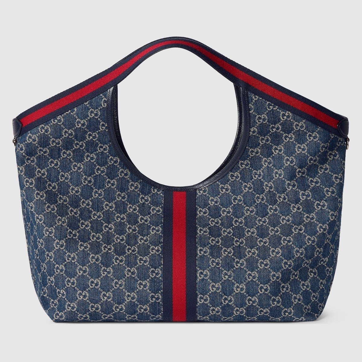 【秀场首发]Gucci Giglio系列大号托特包
853971 
商品详情
Gucci Giglio系列全新亮相佛罗伦萨2026早春时装秀，致敬品牌意式根源，融合隽永传承与革新精神。这款大容量托特包采用GG帆布匠心打造，缀饰织带滚边，并配有一个可拆卸的手拿包。
商品细节
·米白和深棕色GG帆布·饰红绿织带滚边·绿色棉布衬里·双G
·配可拆卸手拿包
顶部提手:18厘米高·磁扣开合
60厘米(宽)x47厘米(高)x16厘米(深)