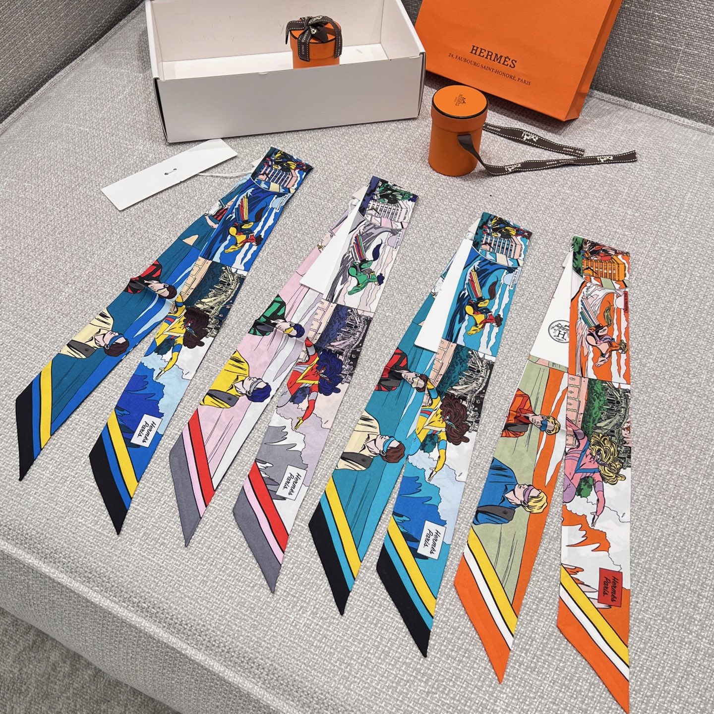 小丝带集合图\nSize：86x5cm100%真丝斜纹绸高版本\n专柜买版实拍、对版品质！Hermes项链、手链、围巾、腰带、手柄，一条小丝巾多样搭配、轻松Get✔️超实用，夏季点缀服饰，很吸睛满分小心机单品！\n原版圆筒包装&密封拉链纸箱\n