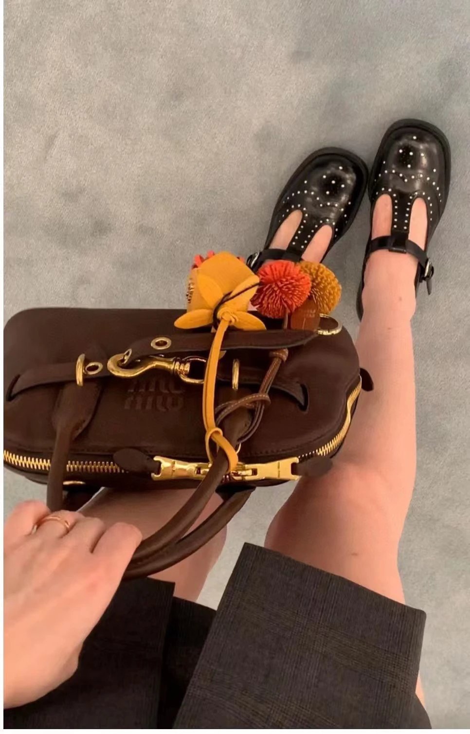 Crafted from leather, this Miu Miu bag charm features a - Comprehensive