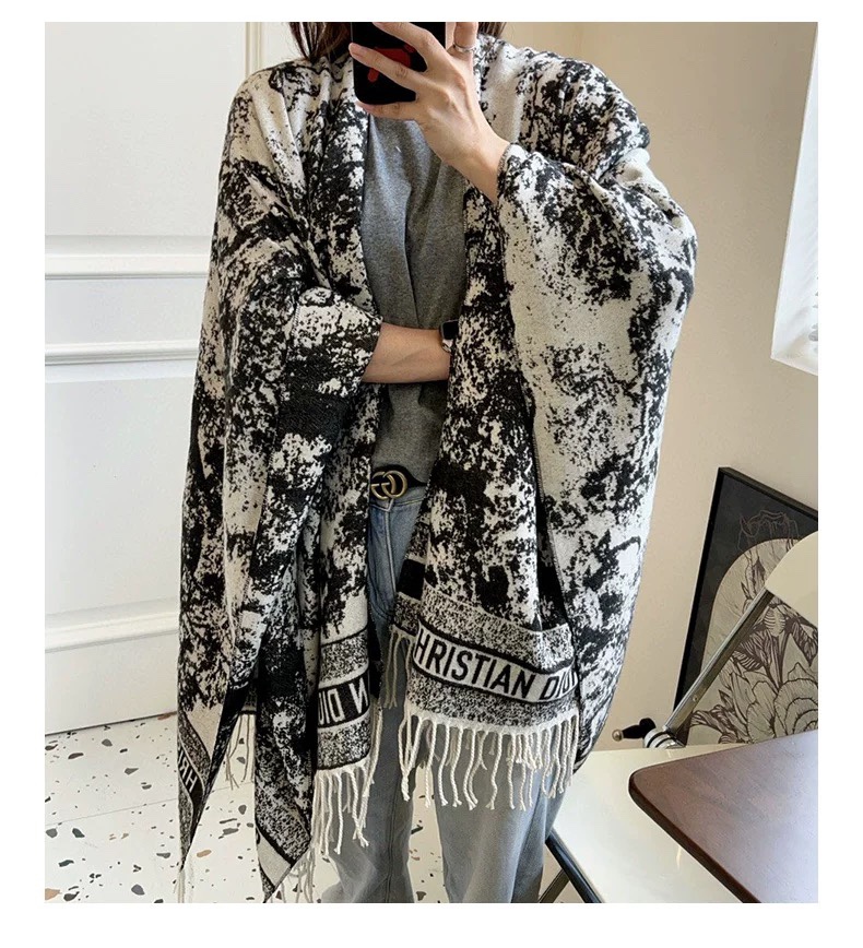 A proper amount of moneyShawls can really be worn with anythingThe drape - Scarf