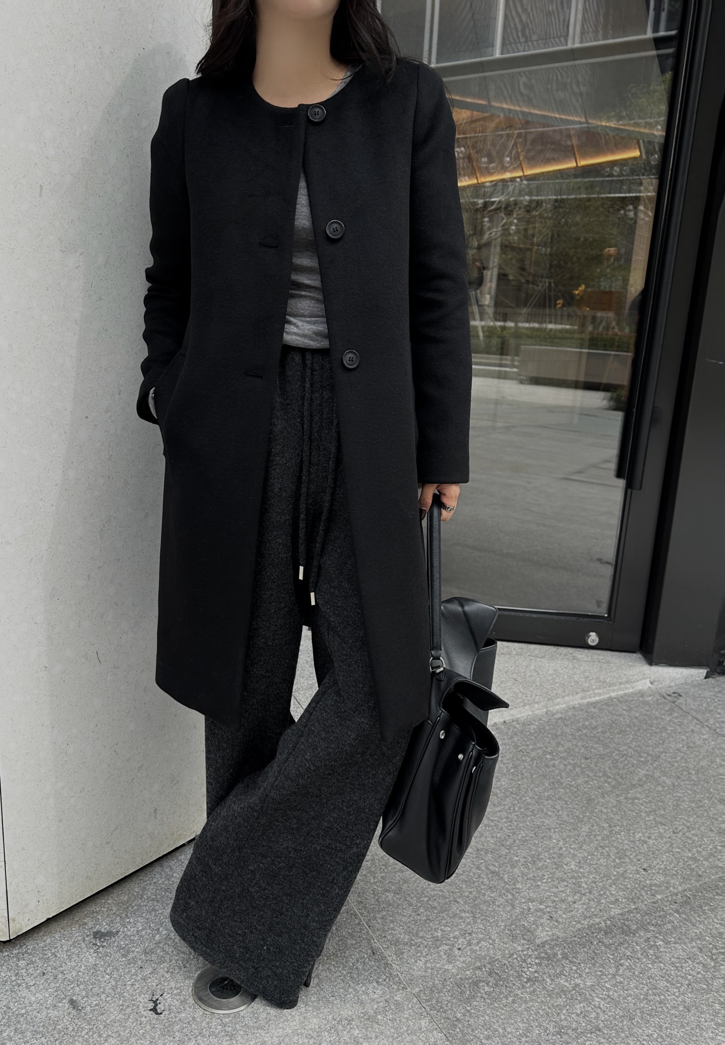 Elegant Round Neck Wool Coat with Pockets, Amber Buttons, and Chic Silhouette