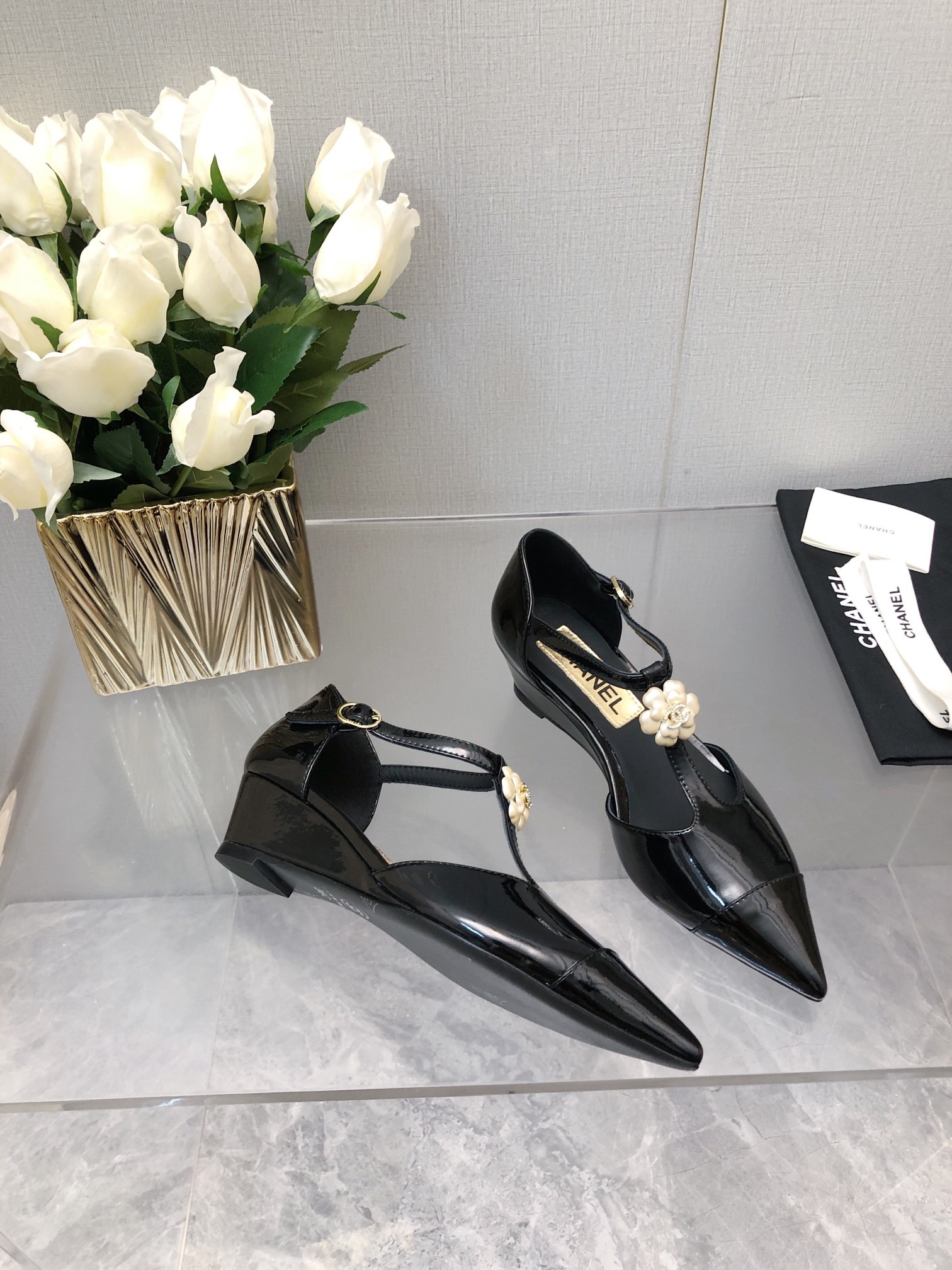 Chanel 25K Women's Black Lambskin Camellia T-Strap Wedge Sandals