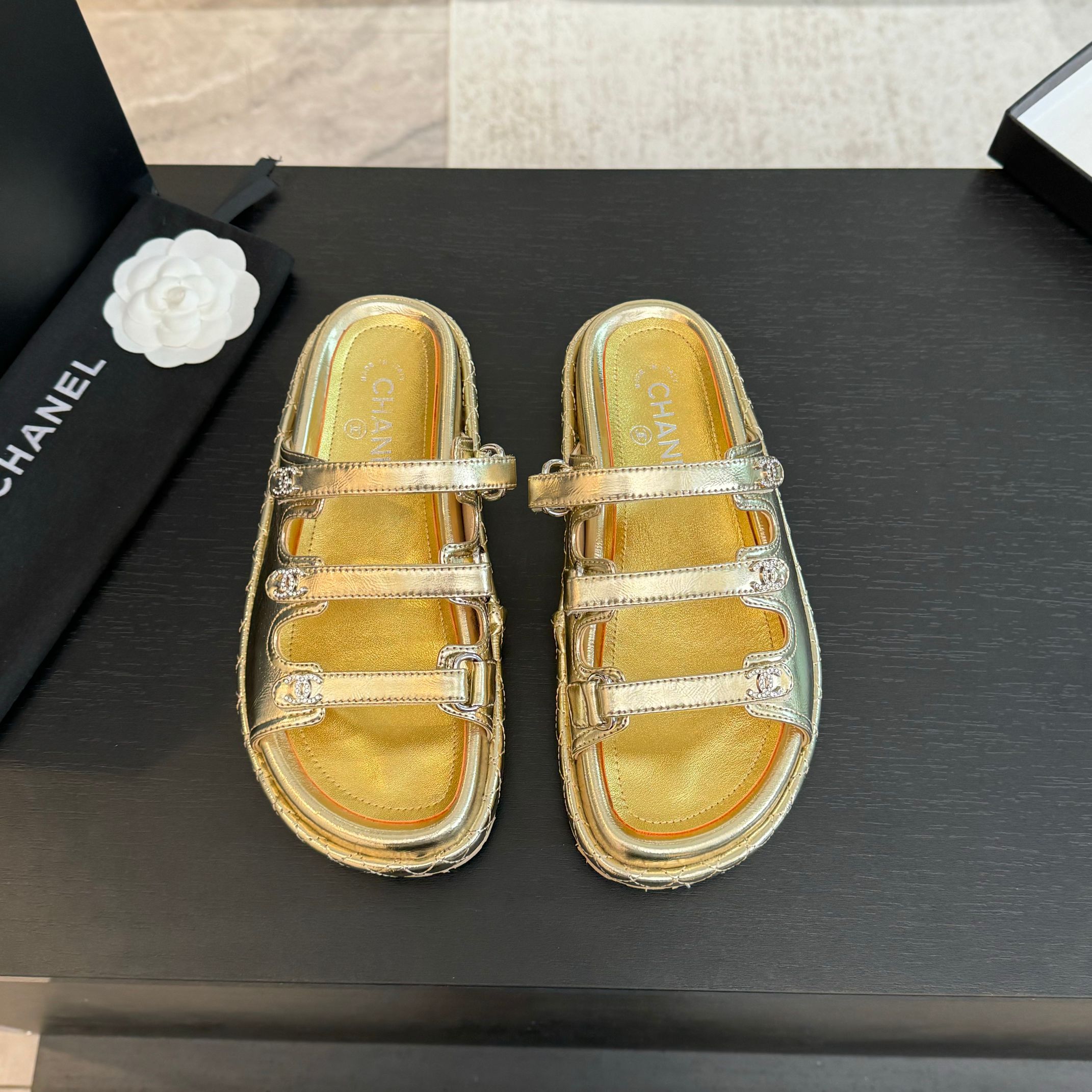 Chanel Women's Gold Lambskin Sandals - Must-Have Summer Beach Slides 3 a1734085829221 2563