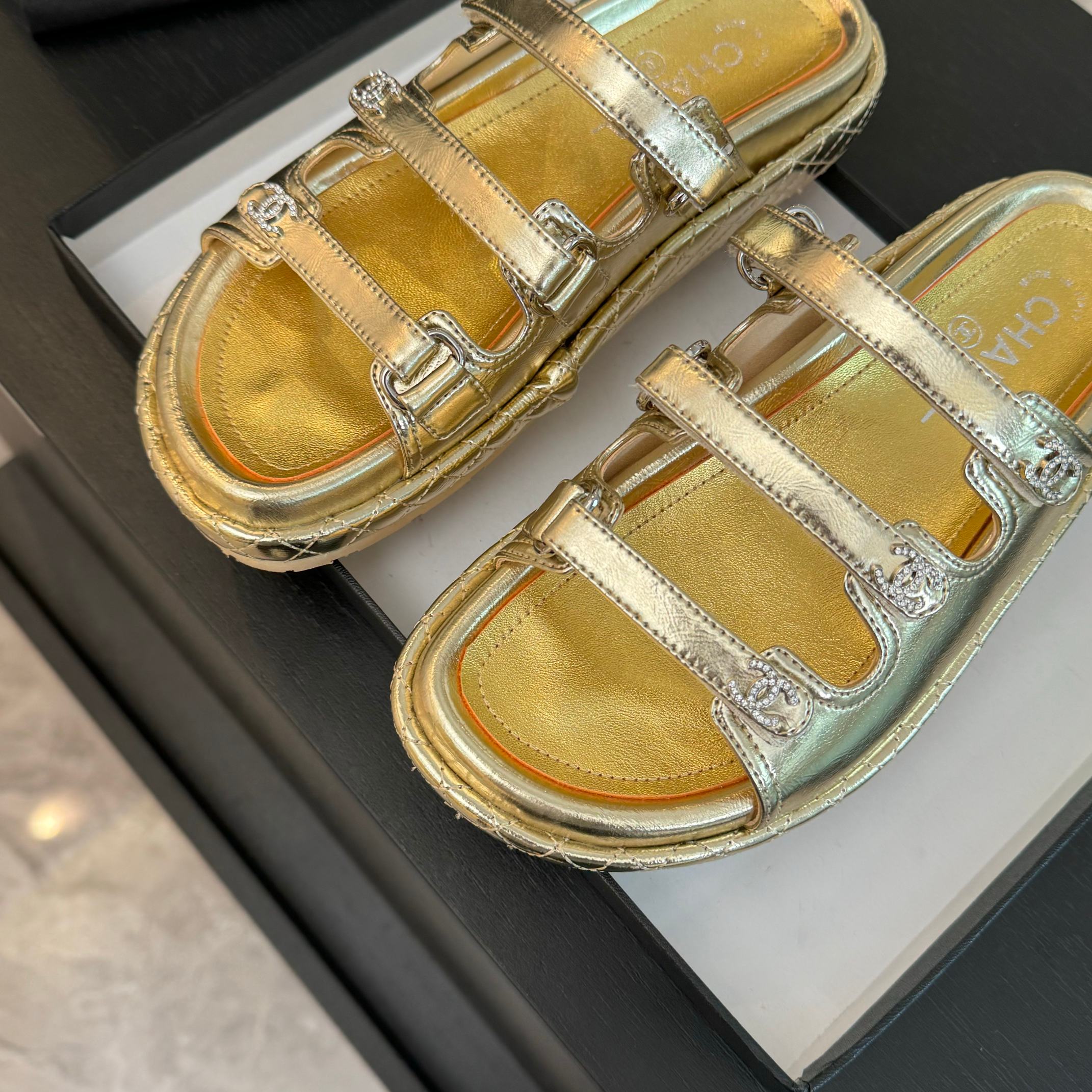 Chanel Women's Gold Lambskin Sandals - Must-Have Summer Beach Slides 4 a1734085829635 3165