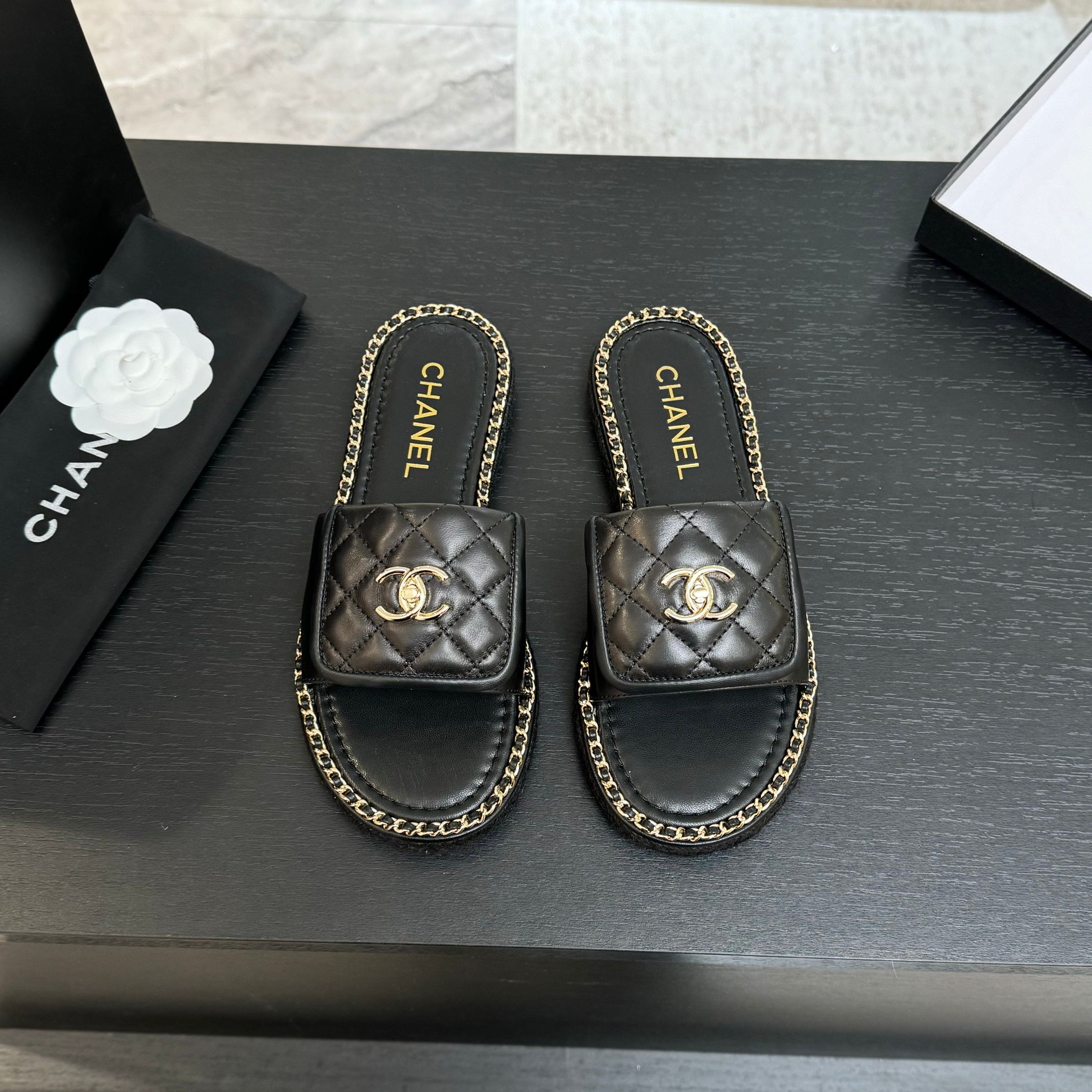 Chanel Black Quilted Leather Chain-Trimmed CC Logo Slide Sandals 3 a1744016347301 7007