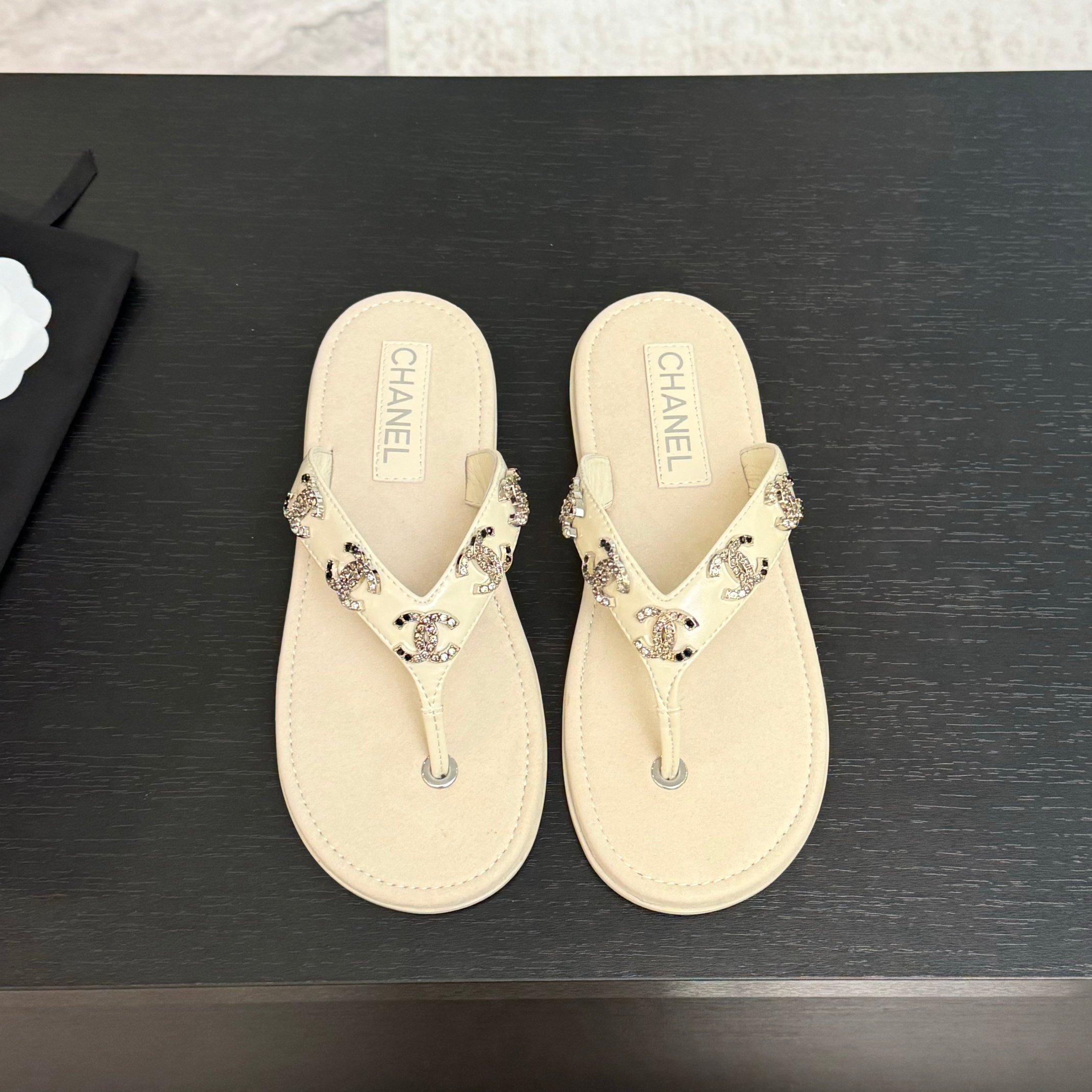 Chanel Women's Lambskin Leather Thong Sandals with CC Embellishments 3 a1744187492361 2130
