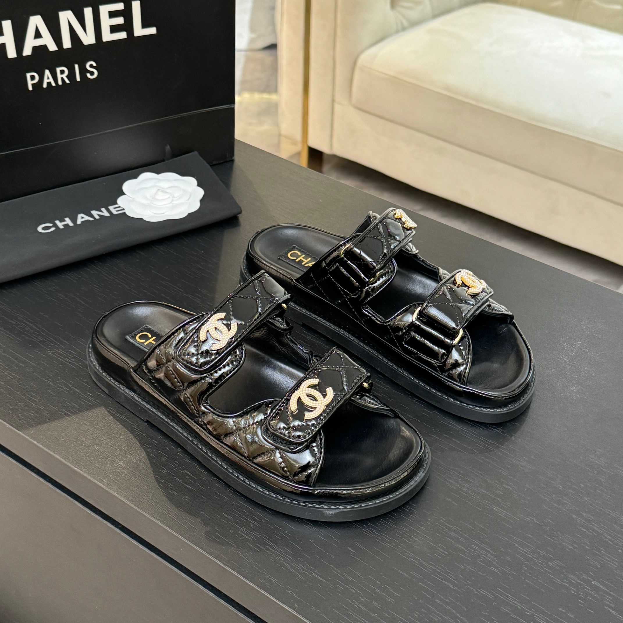 Chanel Women's Black Lambskin Sandals with Adjustable Strap & Gold Logo 1 Chanel Women's Black Lambskin Sandals with Adjustable Strap & Gold Logo