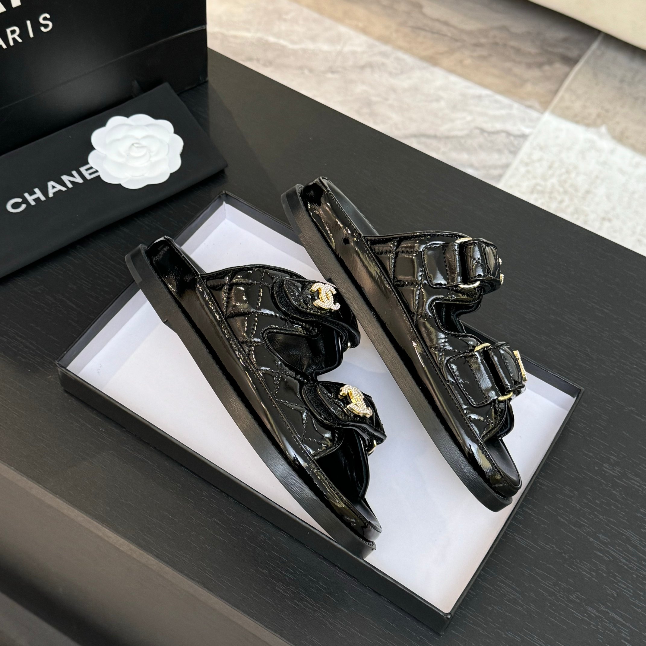 Chanel Women's Black Lambskin Sandals with Adjustable Strap & Gold Logo 10 a1744187988984 7113