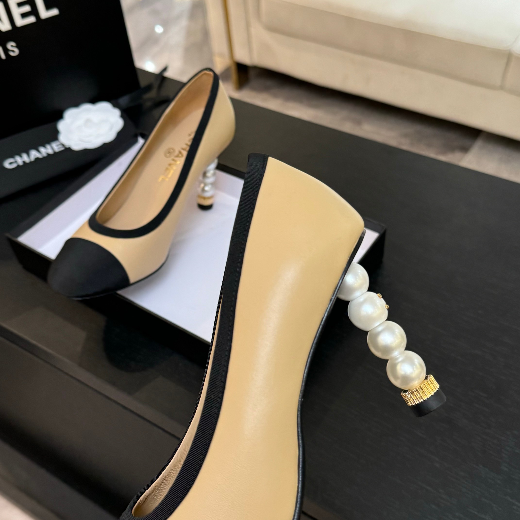 Chanel Women's Beige & Black Leather Pointed Toe Pearl Heel Pumps 9 a1745832514539 8528