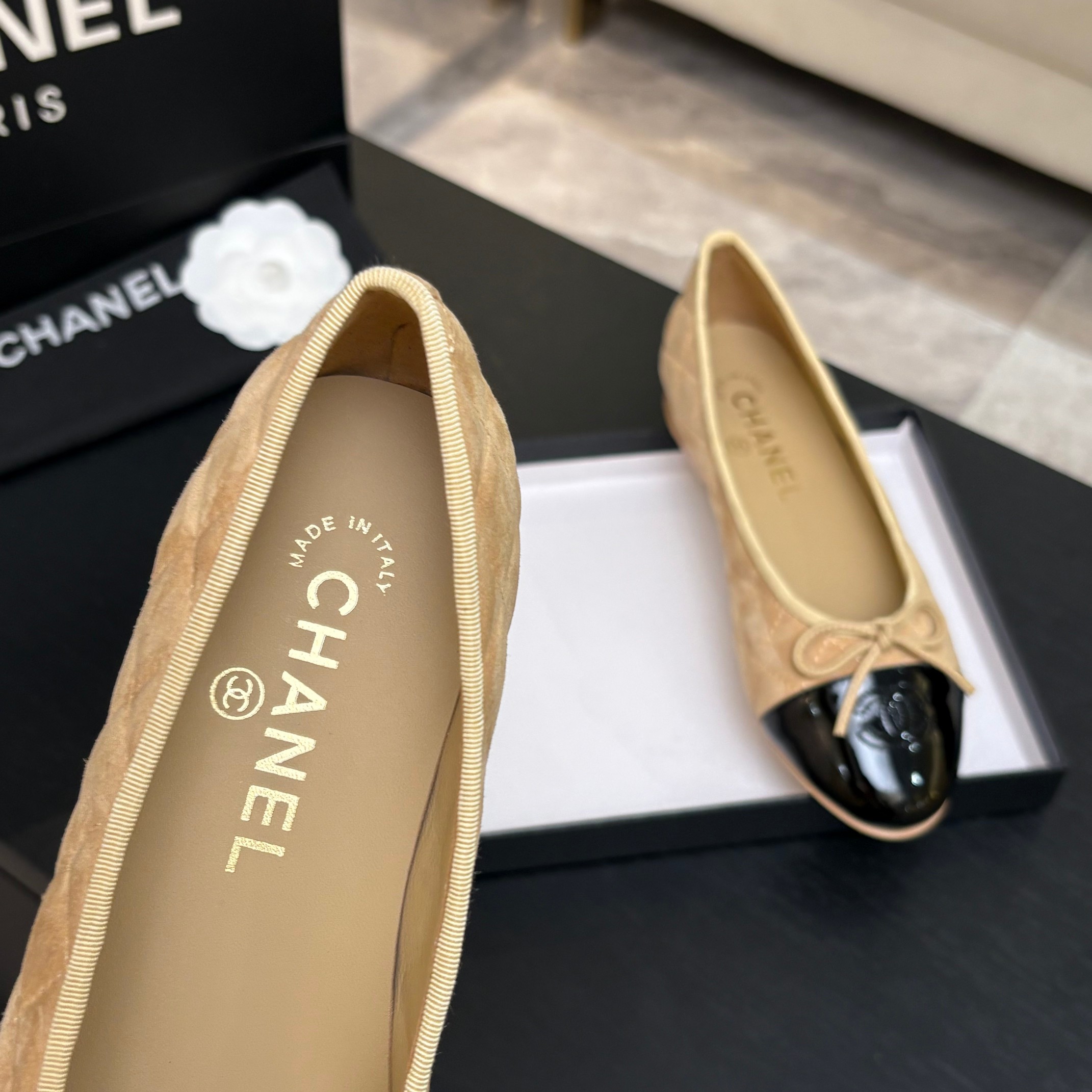 Chanel Quilted Cap-Toe Ballet Flats