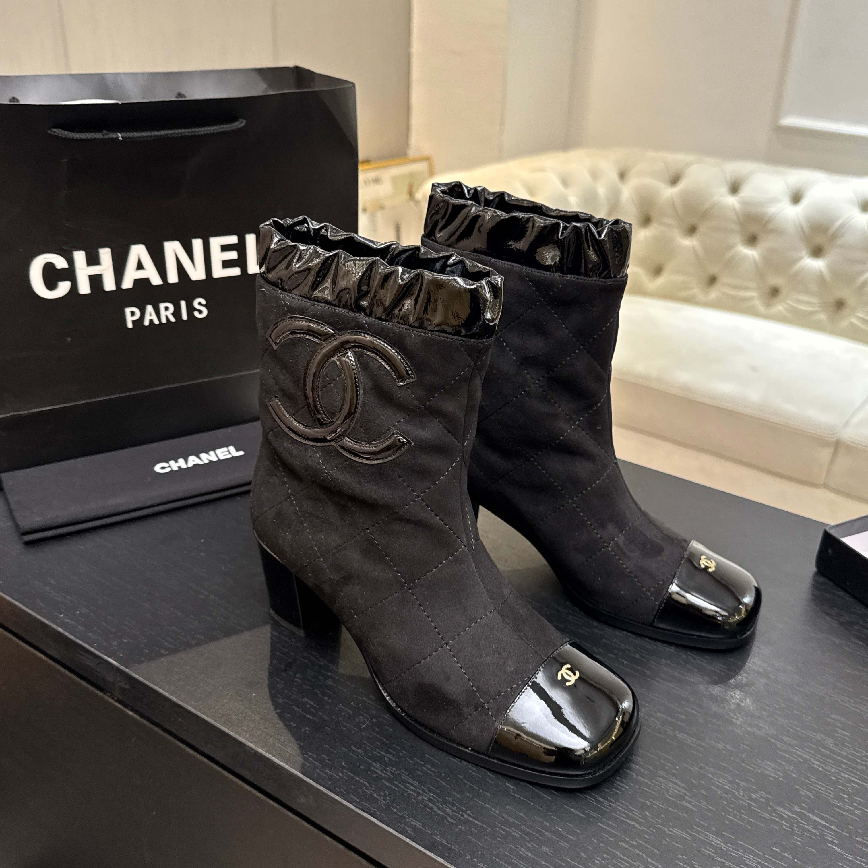 Black Quilted Cap Toe Ankle Boots