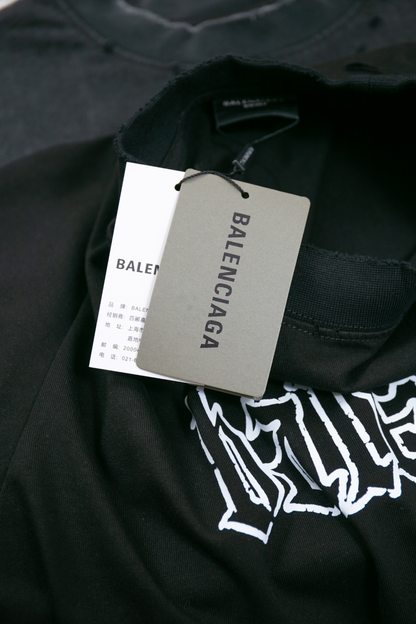 Balenciaga Gothic Logo Distressed Long Sleeve T-Shirt - Unisex 7 windows1756825737563 1079455641 1686560310