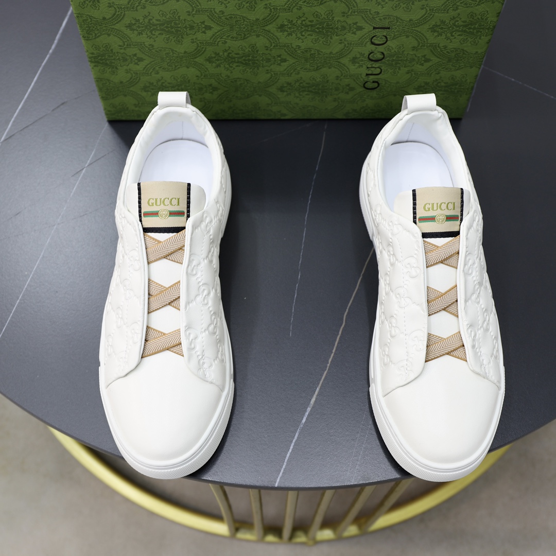 Gucci Men's White Leather Ace Sneakers with Embossed GG Motif
