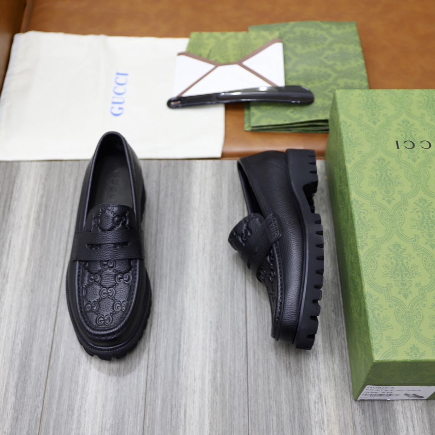 Gucci Men's Black Leather Loafers with Chain G Buckle and GG Embossed Design 3 i1742574774642 2269 0 1