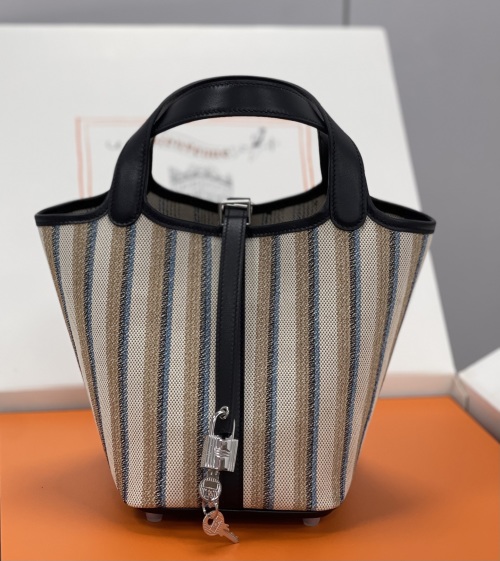 Picotin 18cm Striped Canvas and Swift Leather Bucket Bag with Lock 1 Picotin 18cm Striped Canvas and Swift Leather Bucket Bag with Lock