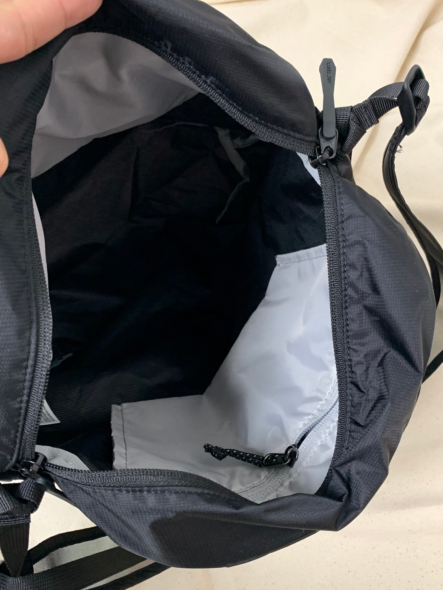 Front tiered compartment designed for quick-access essentials - Comprehensive