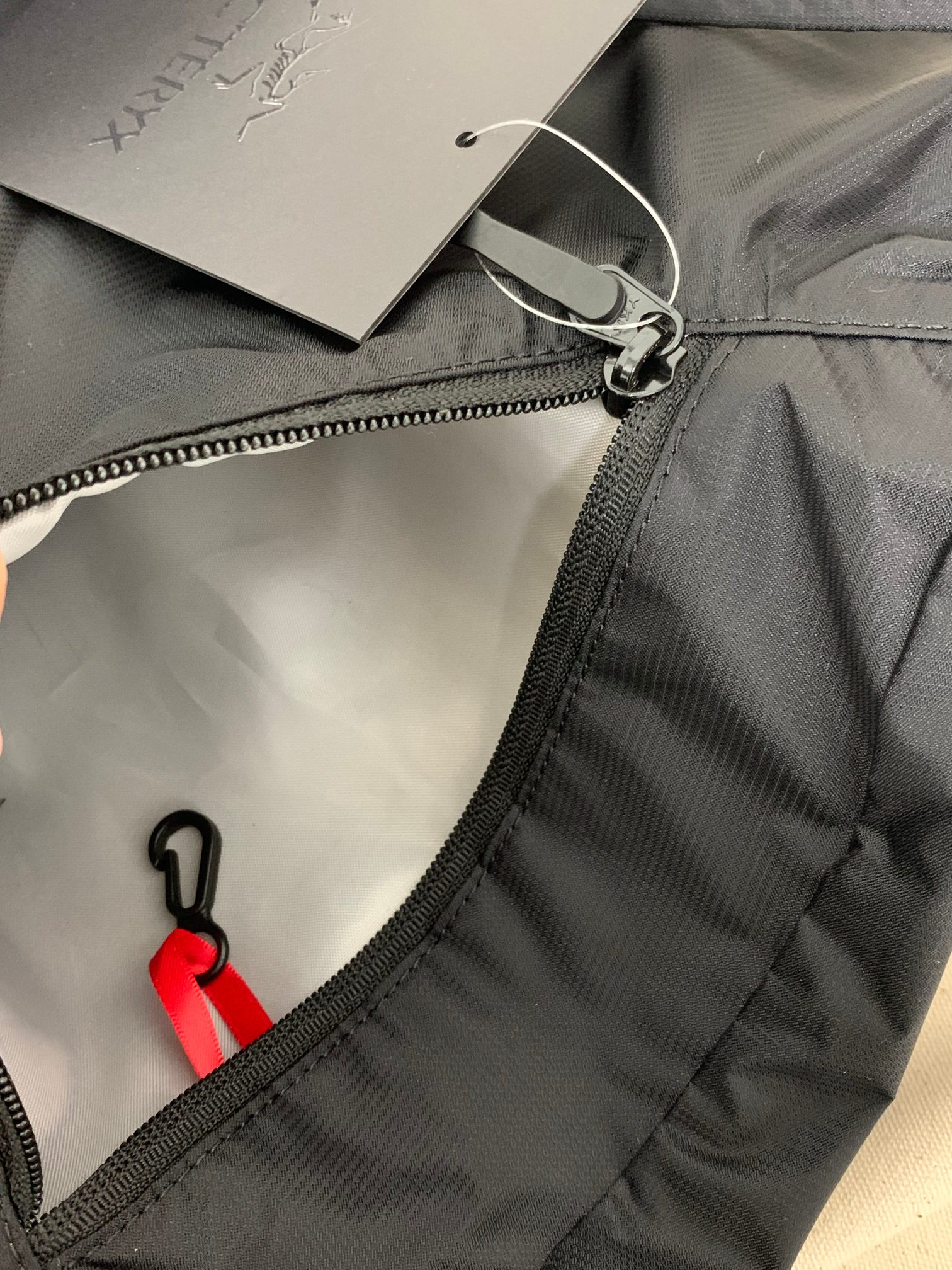 Front tiered compartment designed for quick-access essentials - Comprehensive 2