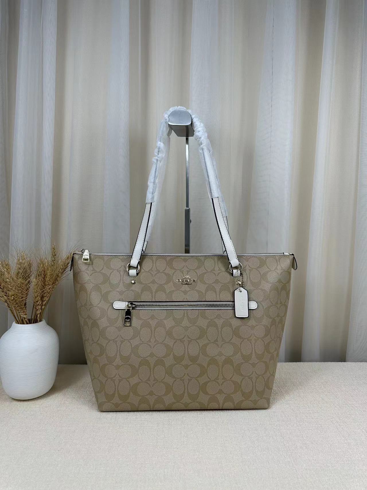 F79609 COACH tote bag, shoulder bag, classic monogram design, fashionable and versatile, size 38*26*11. Available in white, khaki/brown, coffee, and black. In stock now. image 1