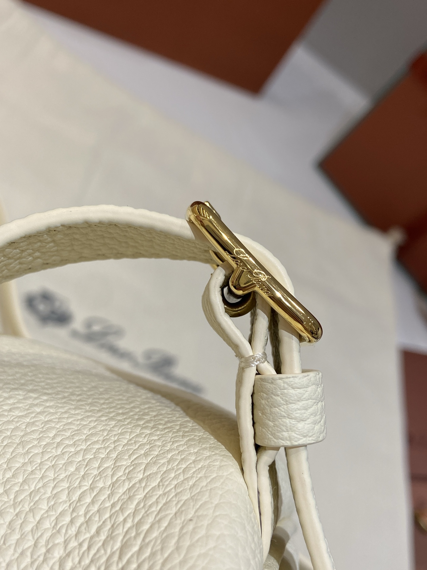 Loro Piana Extra Drawstring Backpack in White Leather with Padlock Charm 9 i1749266776014 5598 0 7