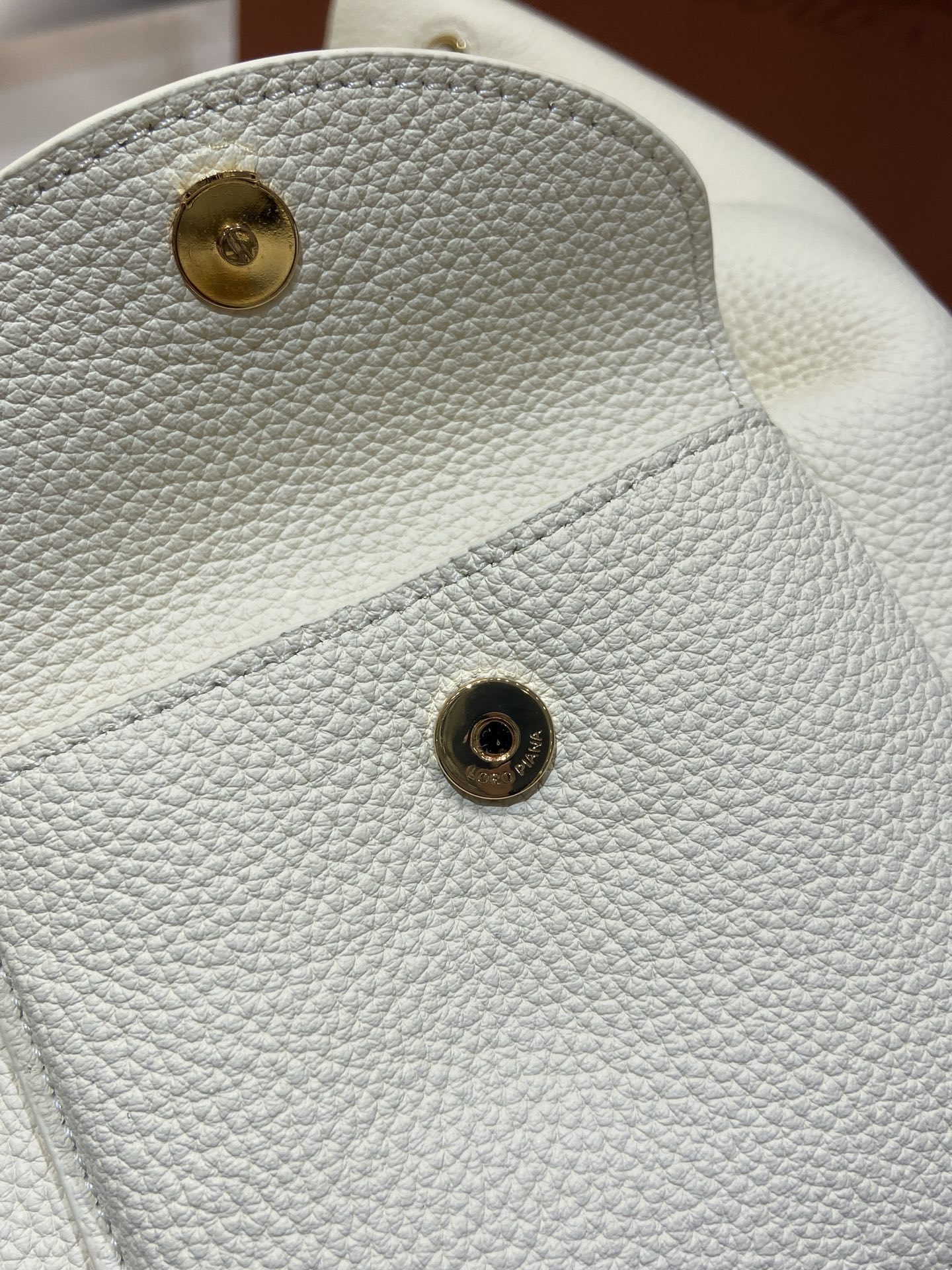 Loro Piana Extra Drawstring Backpack in White Leather with Padlock Charm 5 i1749266776181 8668 0 3