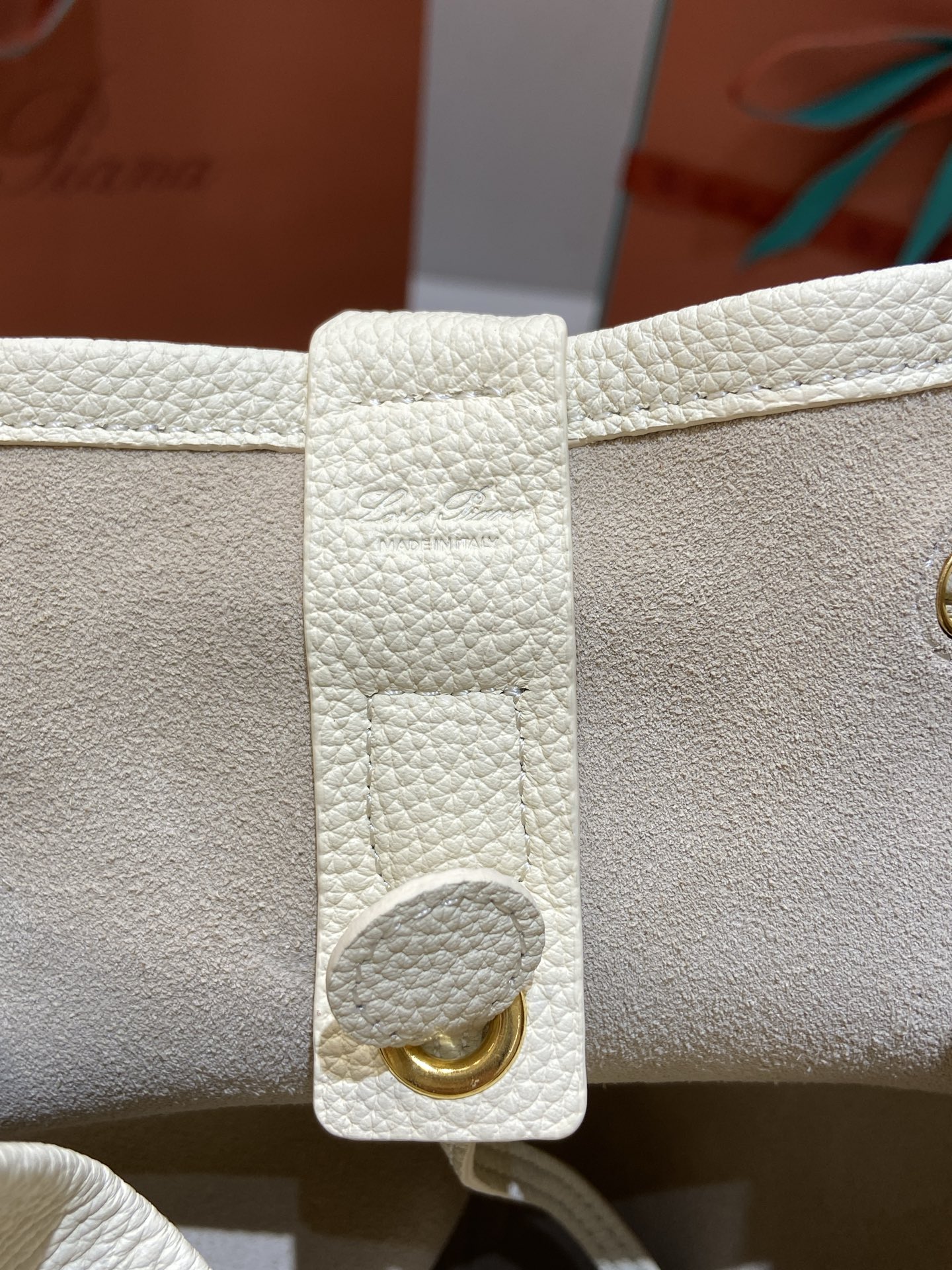 Loro Piana Extra Drawstring Backpack in White Leather with Padlock Charm 8 i1749266783250 6931 0 6