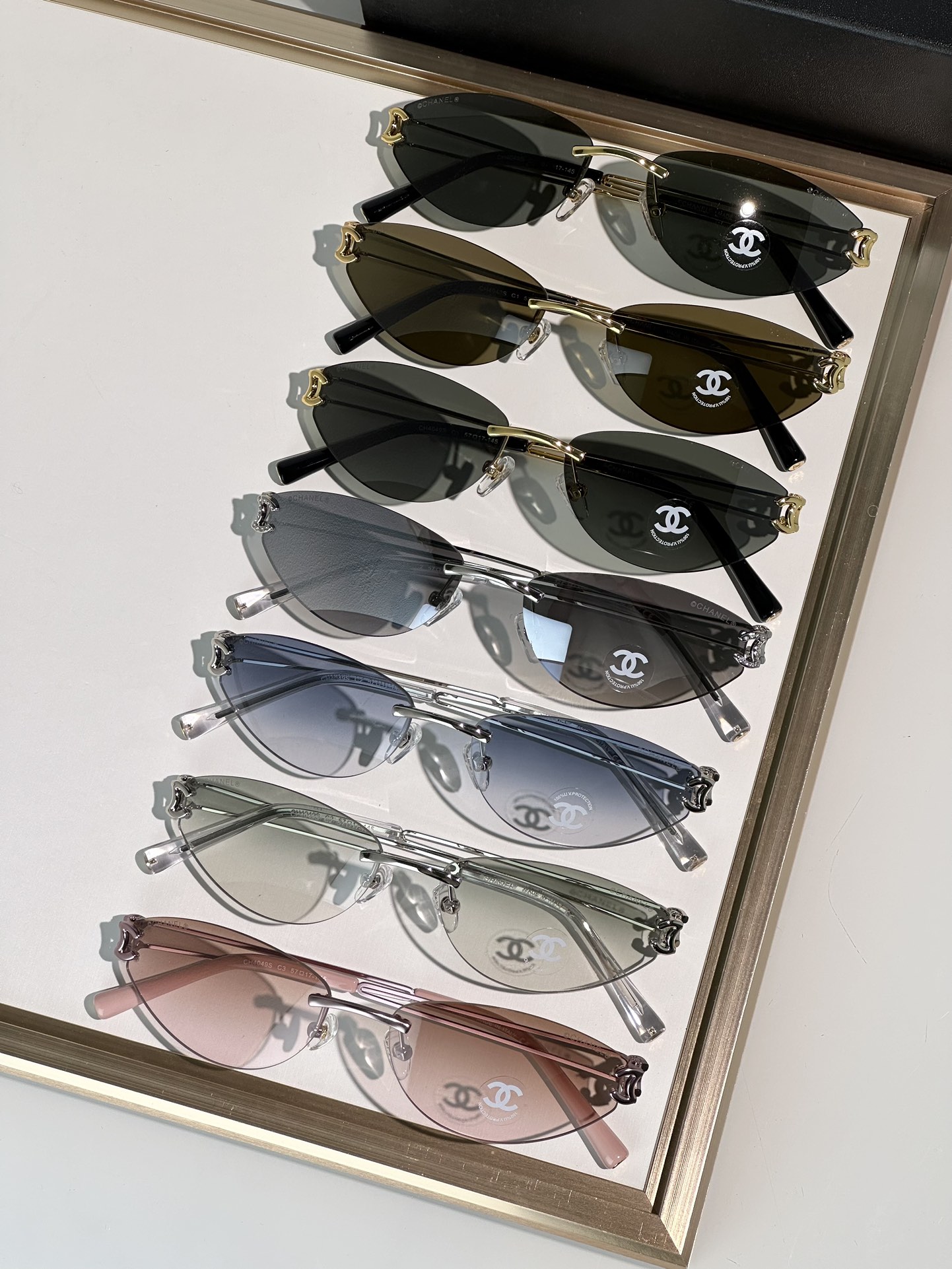 Elegant Rimless Sunglasses CH4049S, Designer Shades for Women