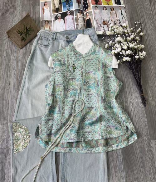 Elegant Silk Blend Sleeveless Blouse with Mandarin Collar and Unique Hem 1 Elegant Silk Blend Sleeveless Blouse with Mandarin Collar and Unique Hem