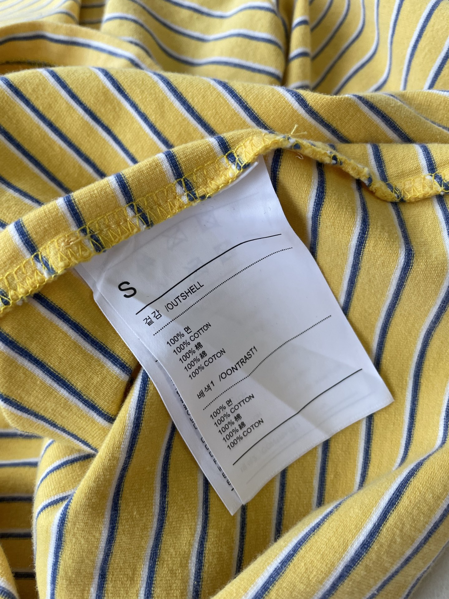 WE11DONE’s Striped Tee Elevates P506 Female Suit with Playful Colors and Mystery - 图片 7