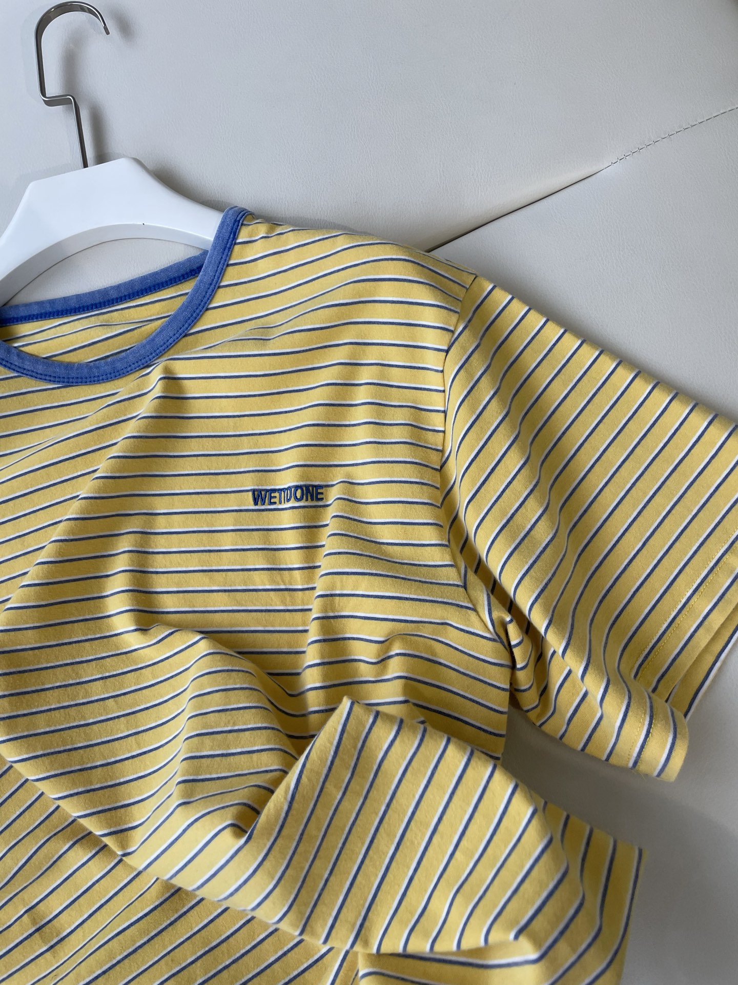 WE11DONE’s Striped Tee Elevates P506 Female Suit with Playful Colors and Mystery - 图片 5