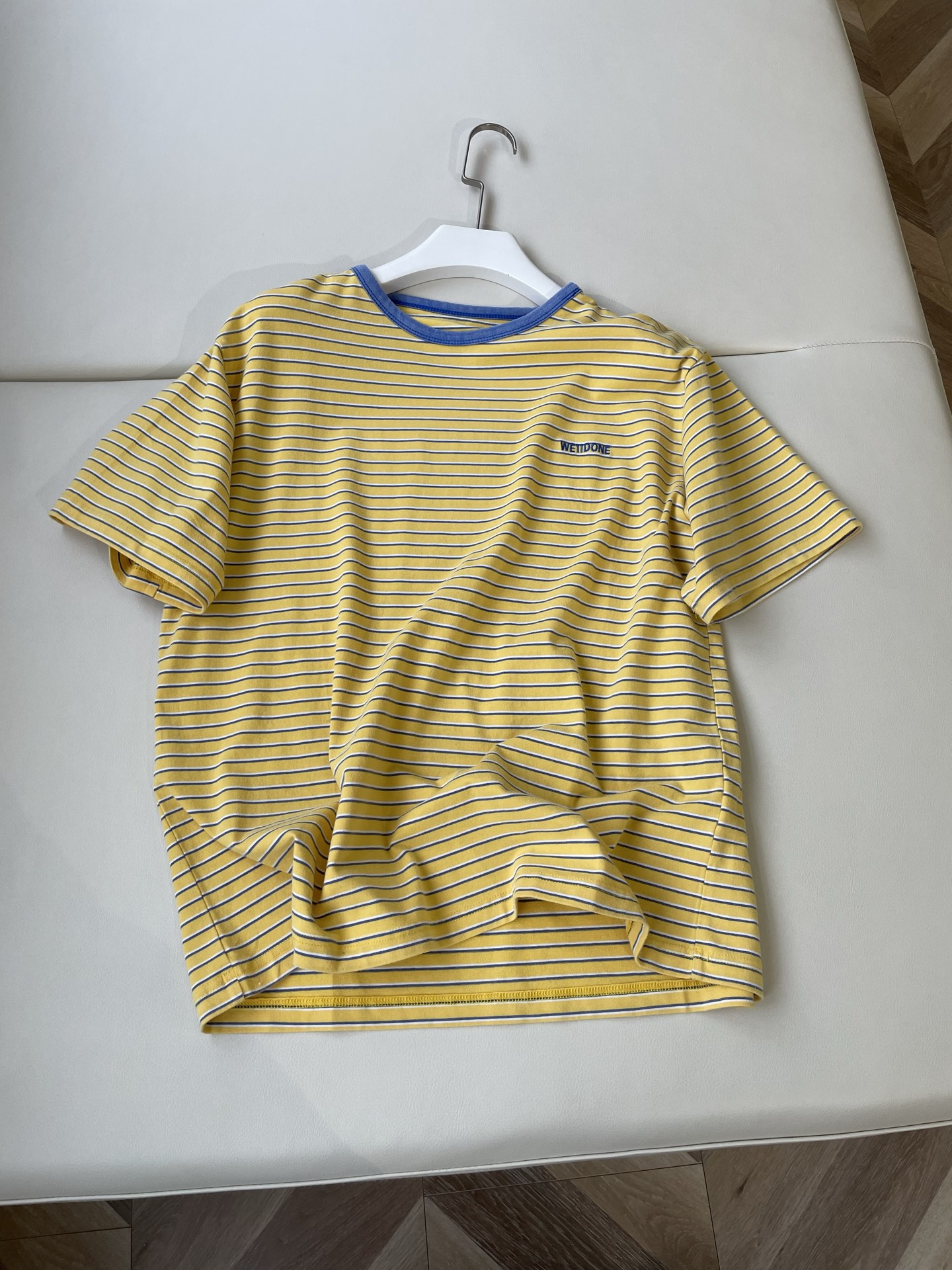 WE11DONE’s Striped Tee Elevates P506 Female Suit with Playful Colors and Mystery