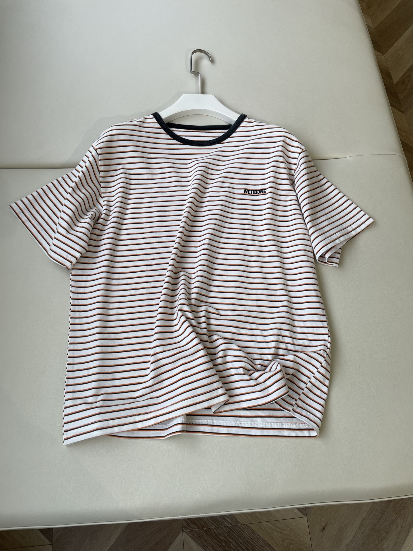 “WE11DONE’s New Stripe Tee Enhances P506 Female Suit with Playful Colors”