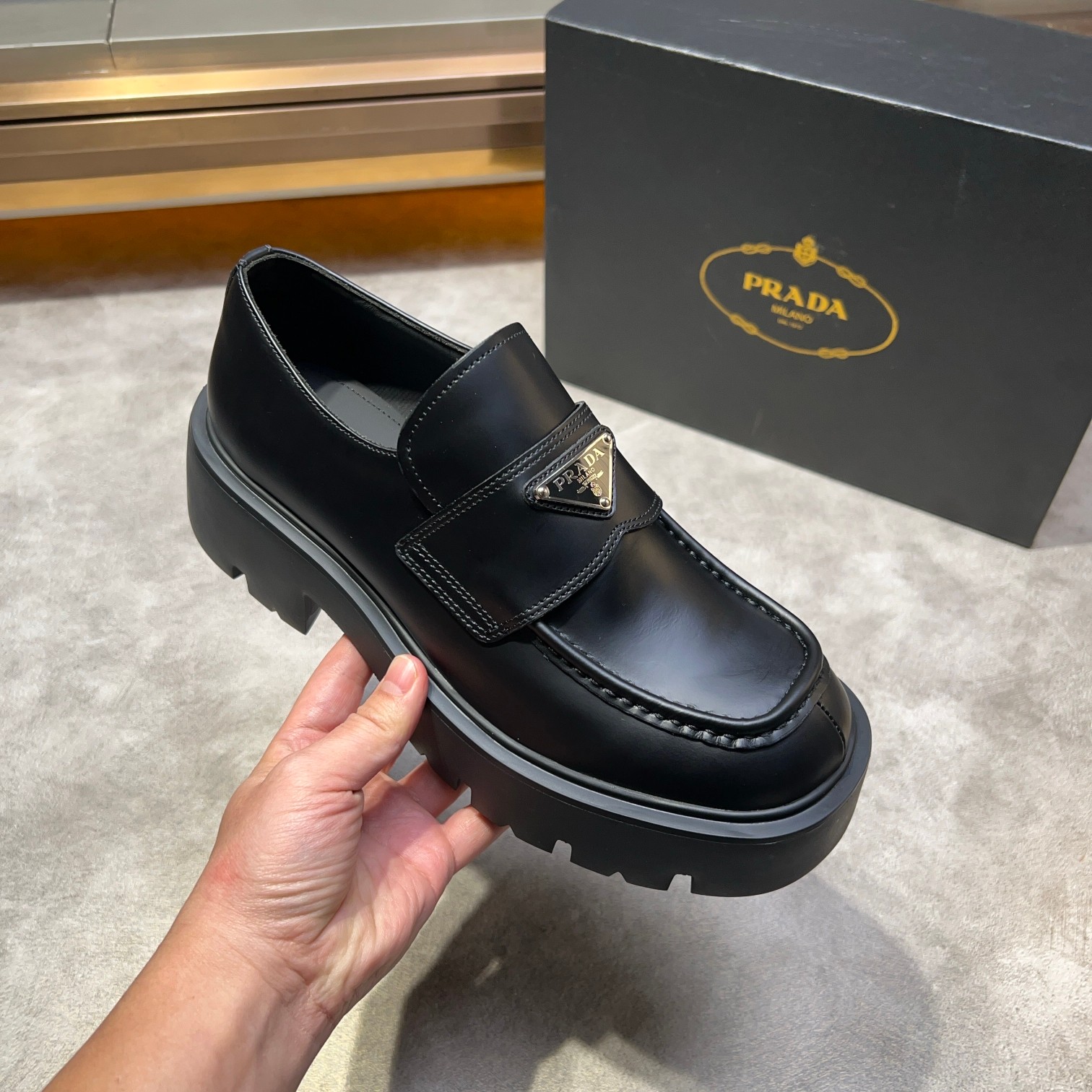 Prada Leather Loafers with Enamel Triangle Logo - Classic Style & Comfort 9 a1735114837597 8616