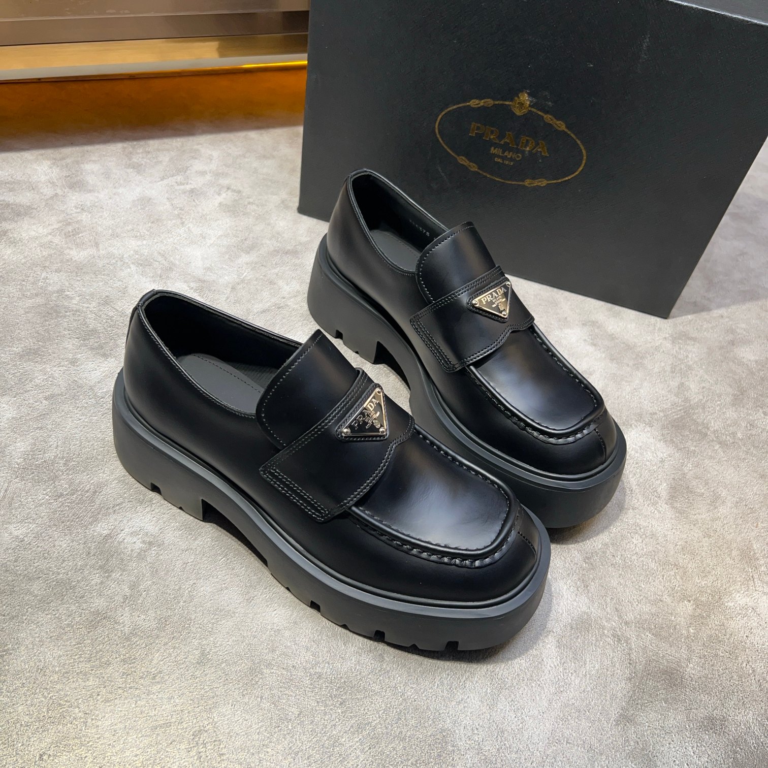 Prada Leather Loafers with Enamel Triangle Logo - Classic Style & Comfort 6 a1735114837656 3220