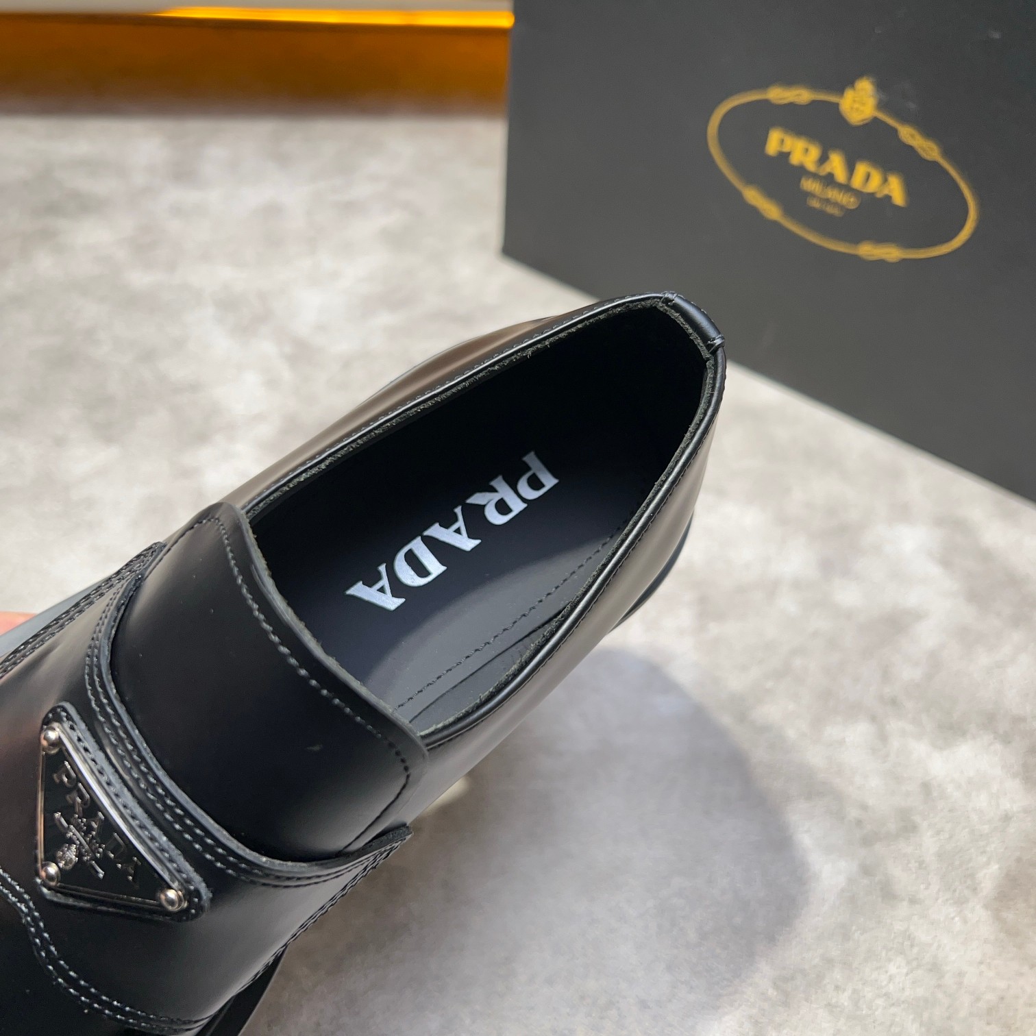 Prada Leather Loafers with Enamel Triangle Logo - Classic Style & Comfort 8 a1735114837746 4577