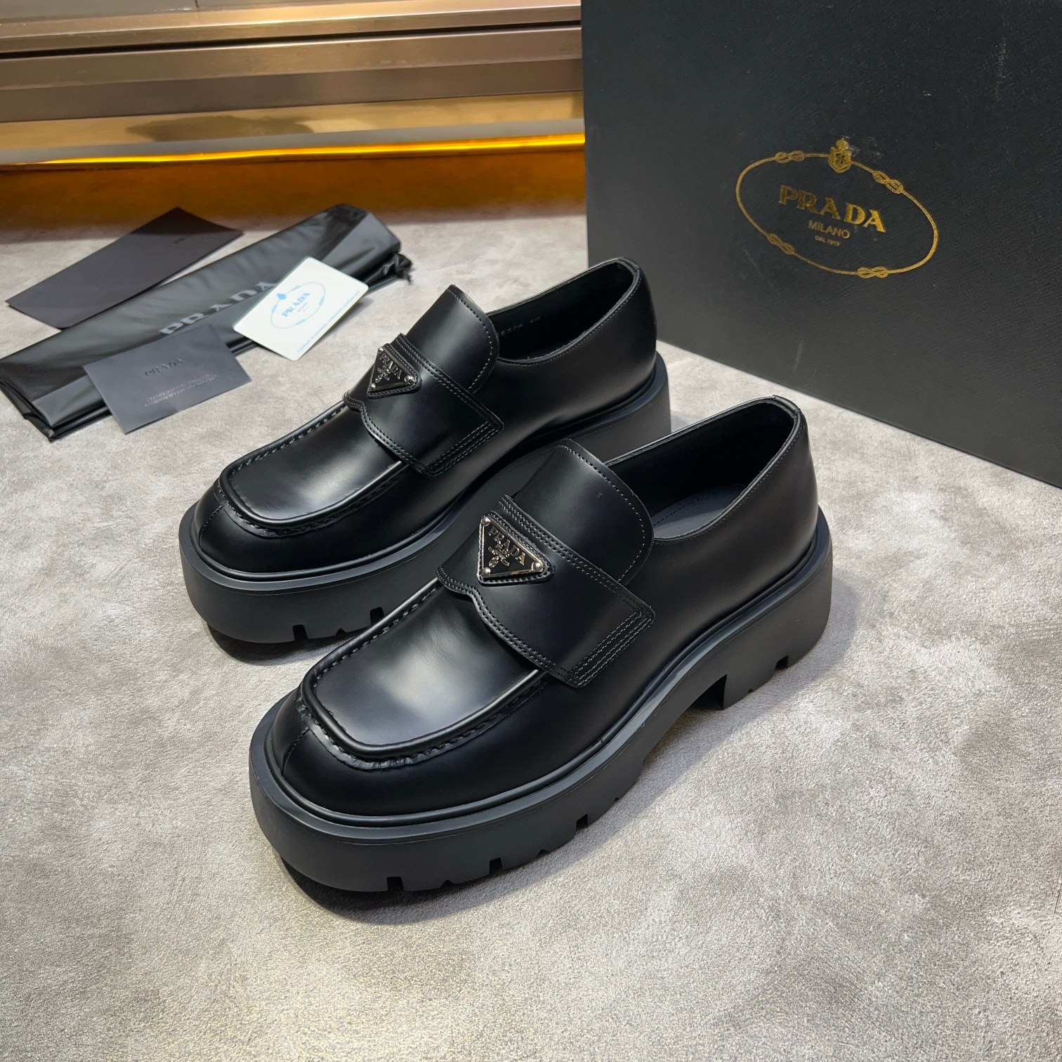 Prada Leather Loafers with Enamel Triangle Logo - Classic Style & Comfort 3 a1735114837758 8764