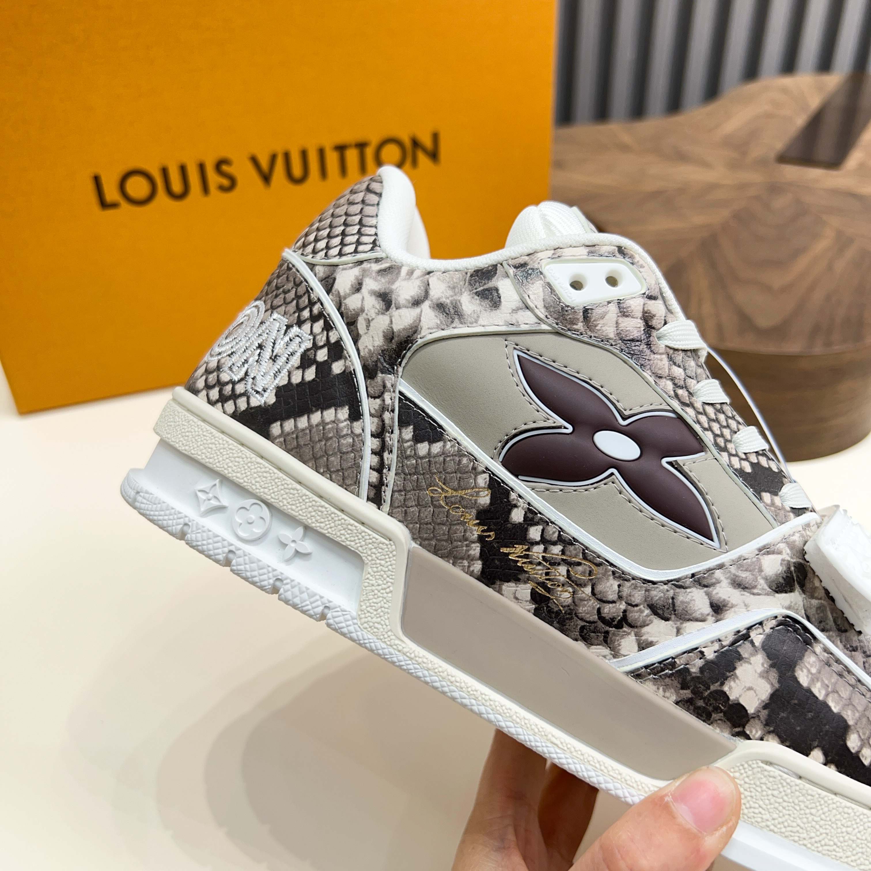 Louis Vuitton Trainer Sneaker in Monogram Embossed Leather 6 a1743229953188 7602