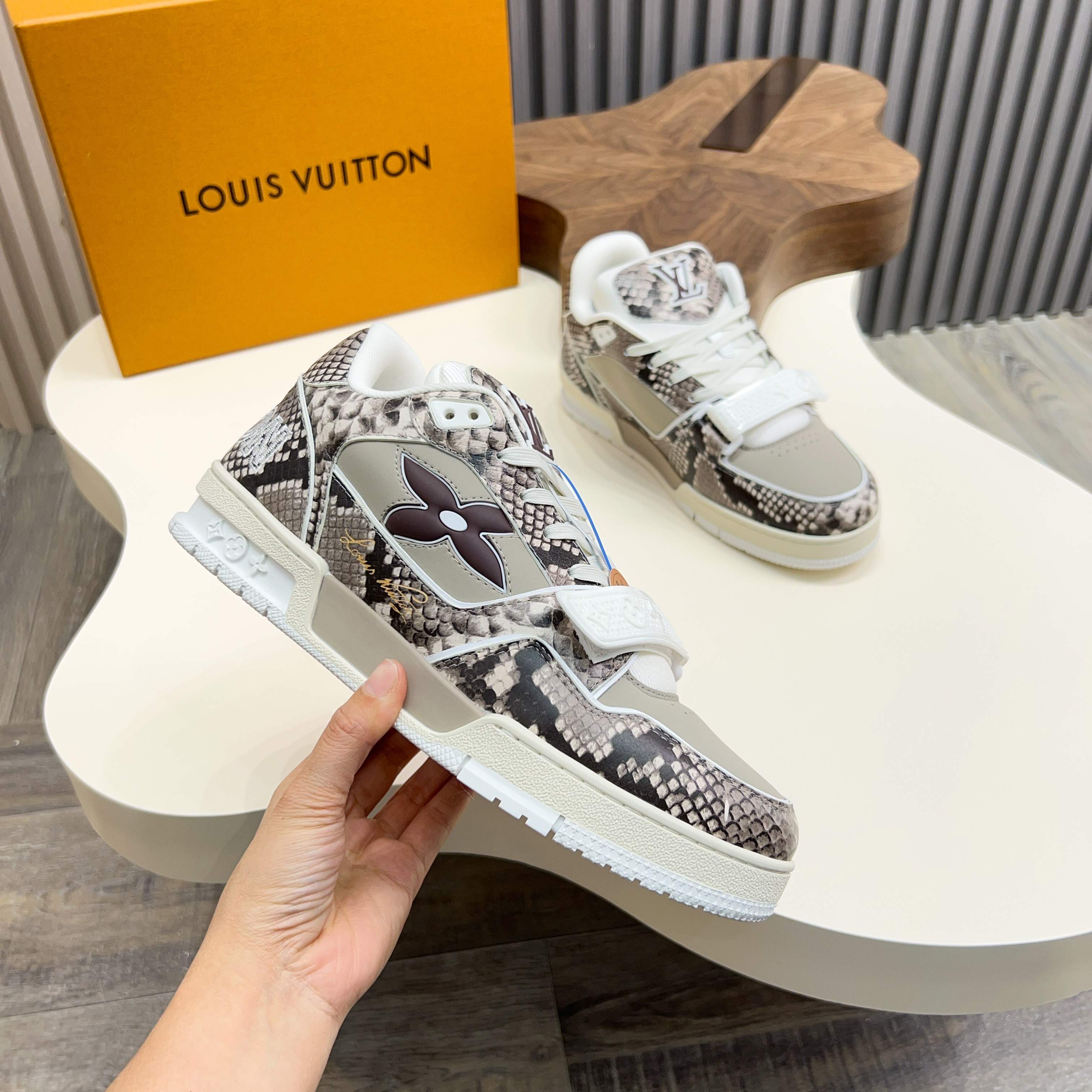 Louis Vuitton Trainer Sneaker in Monogram Embossed Leather 3 a1743229953300 4262